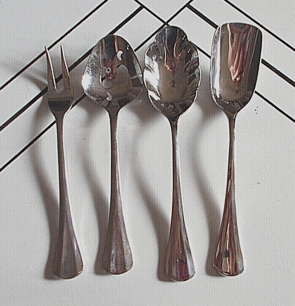 4PC. LOT INTERNATIONAL LYON 18/8 SYMMETRY HOSTESS SERVING PCS.