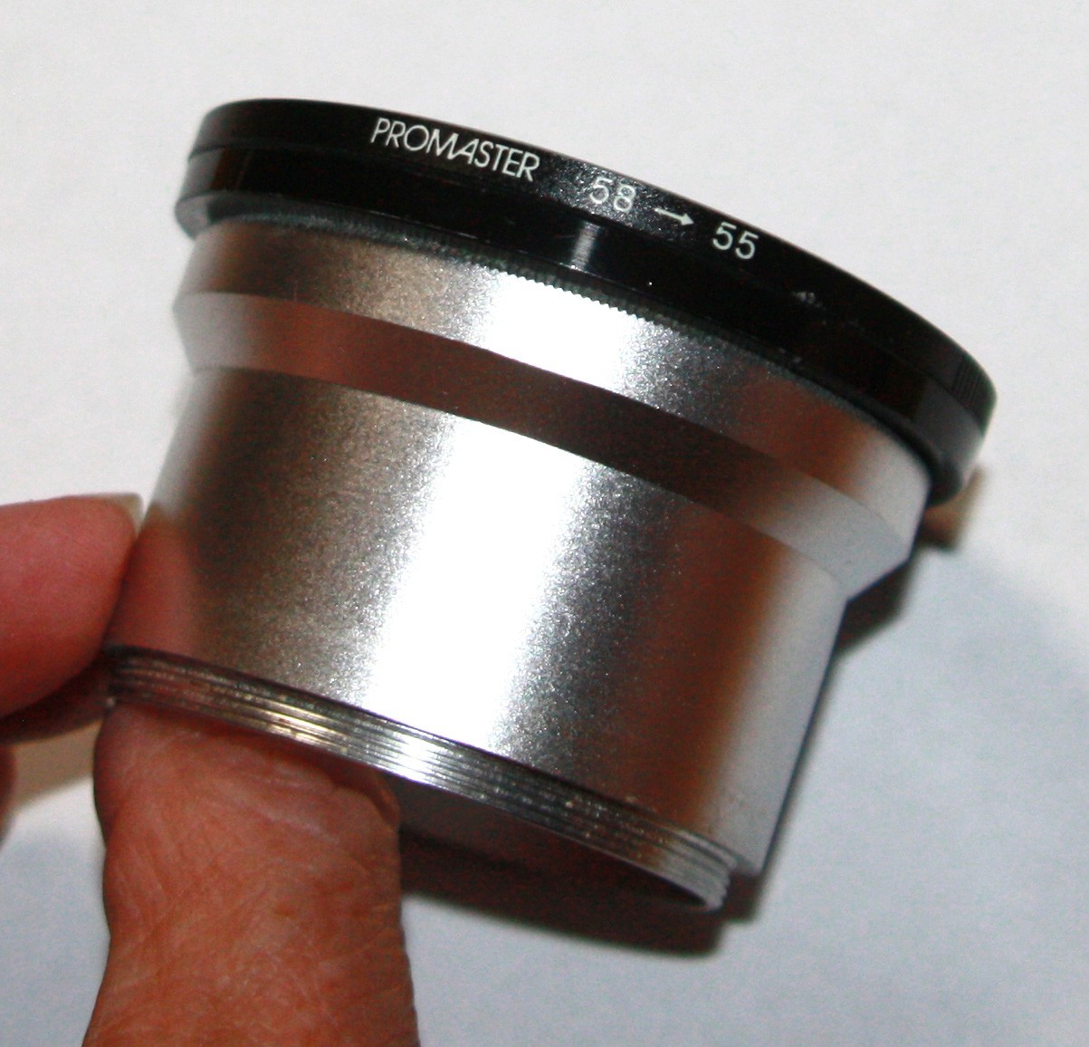 Promaster adaptor tube for Olympus 45.6-52 52mm to 58mm