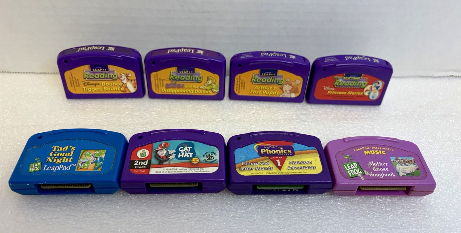 Lot of 8 LeapFrog Leapster Game Cartridges. Tigger Scooby Arthur Princess.