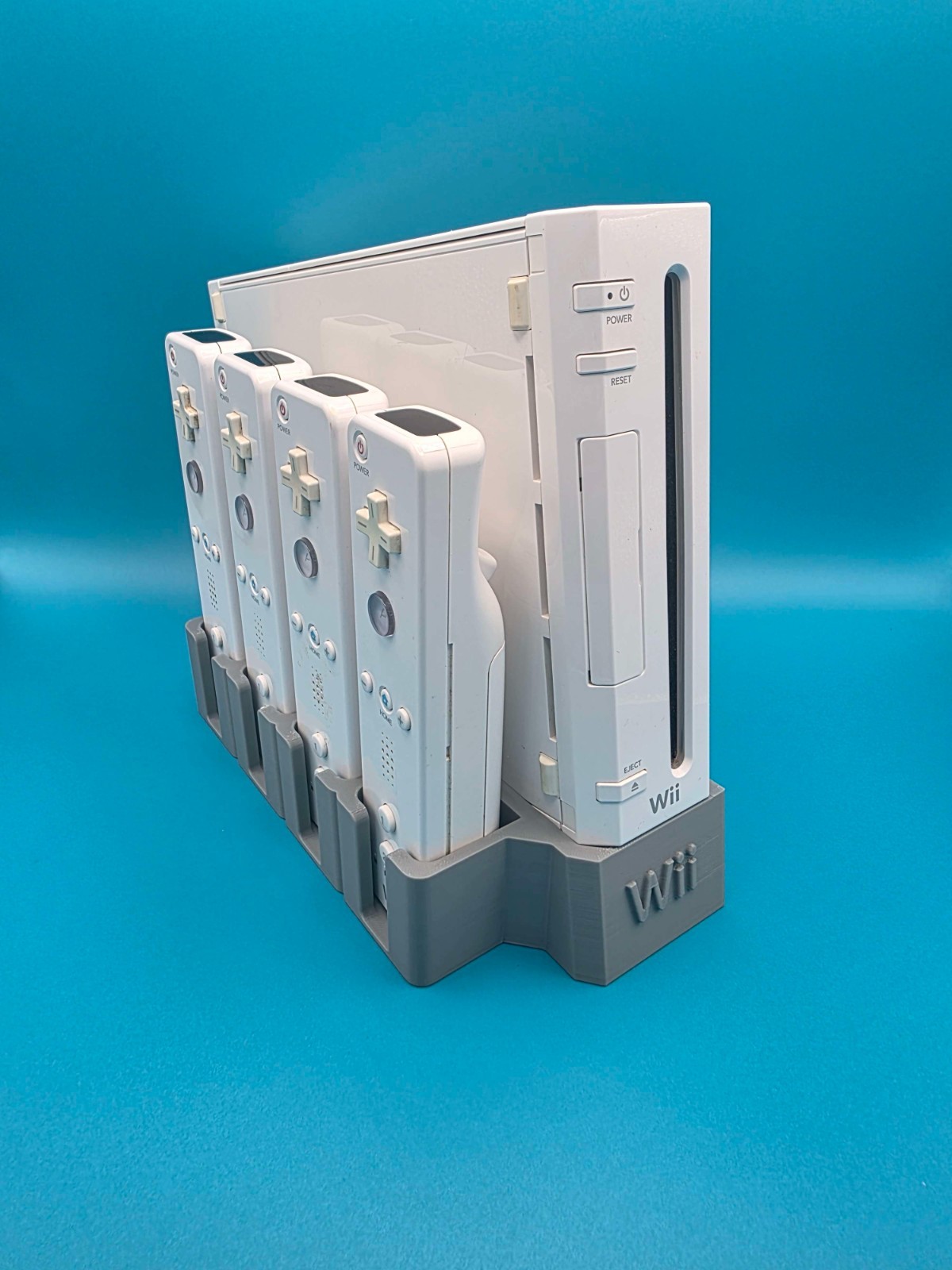 Nintendo Wii stand with slots for 4 remotes (No rubber sleeve) multiple colors.