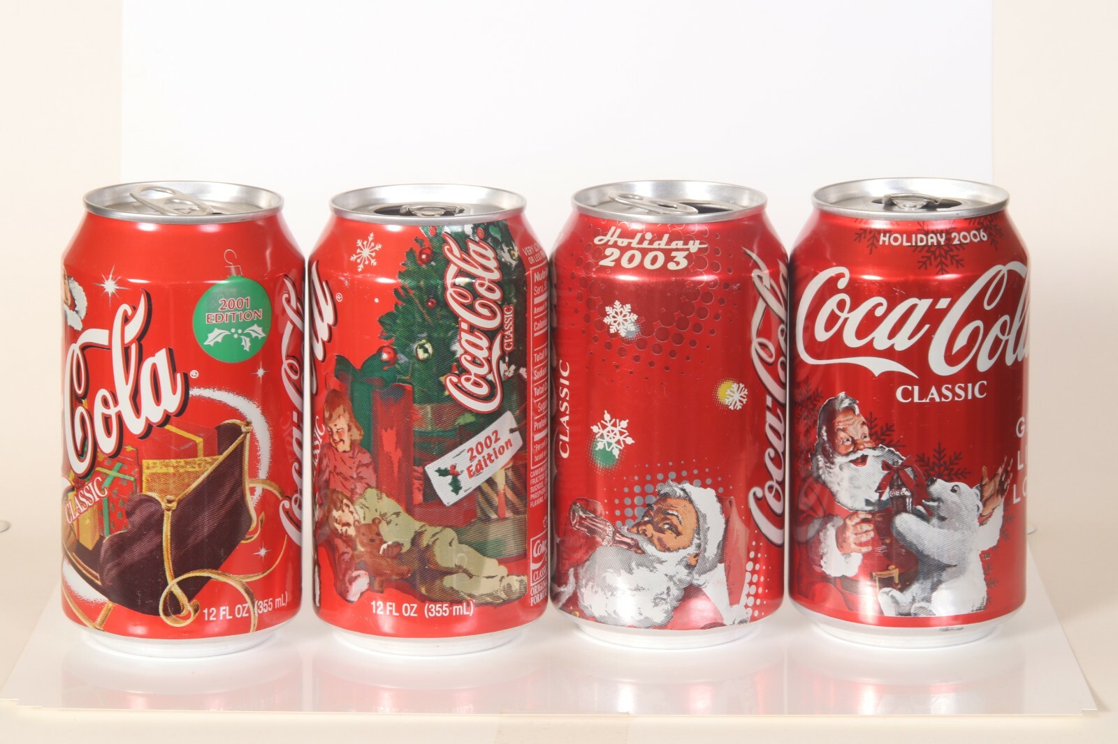 4 Coke cola Soda cans