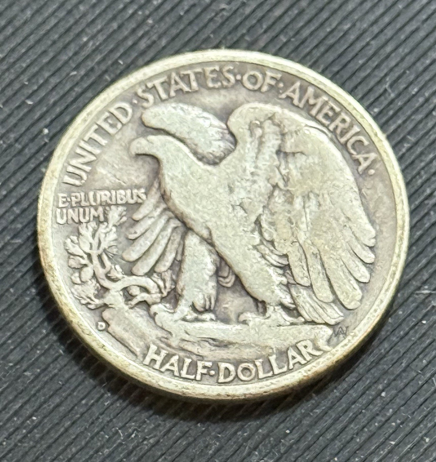 1938-D 50C Walking Liberty Half Dollar. VF condition
