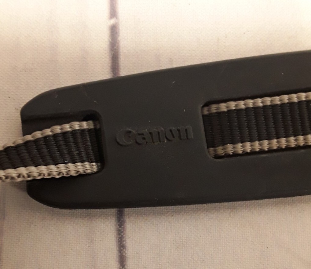 Canon E57 video camera Lens Cap 49mm & Shoulder Strap