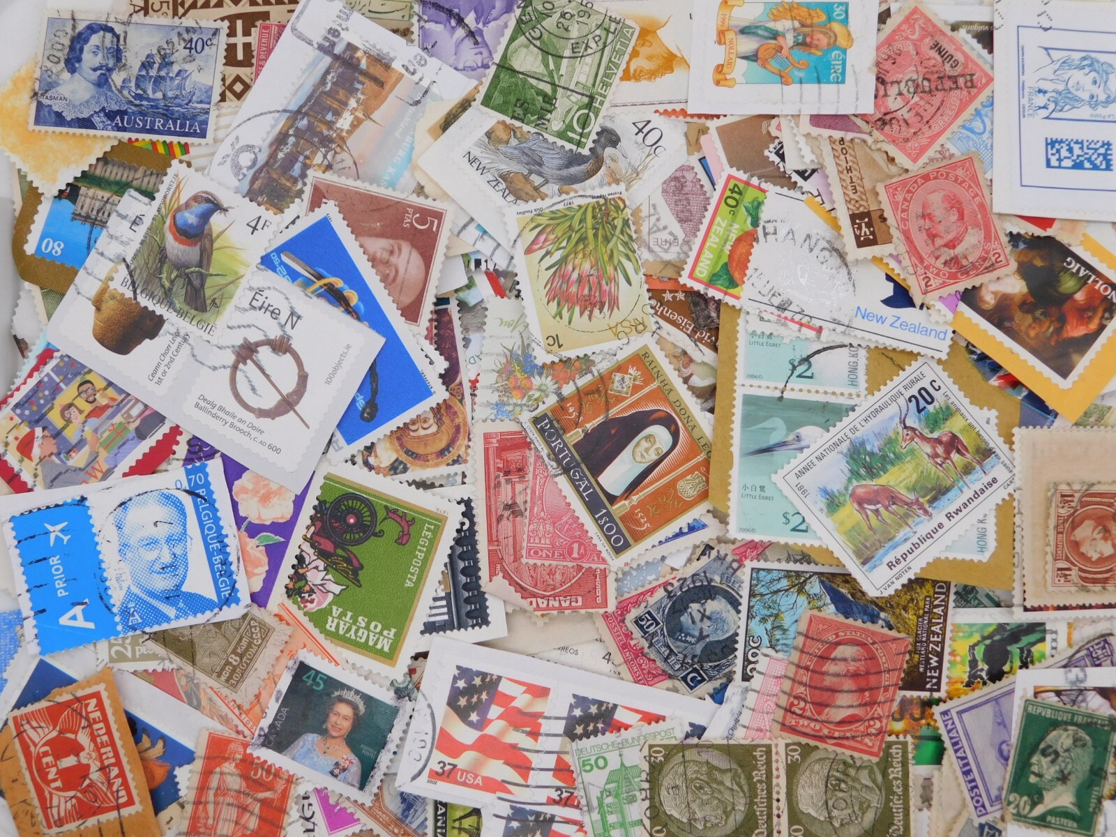 STAMP WORLD WIDE 70g lot ON paper charity commemorative collection kiloware