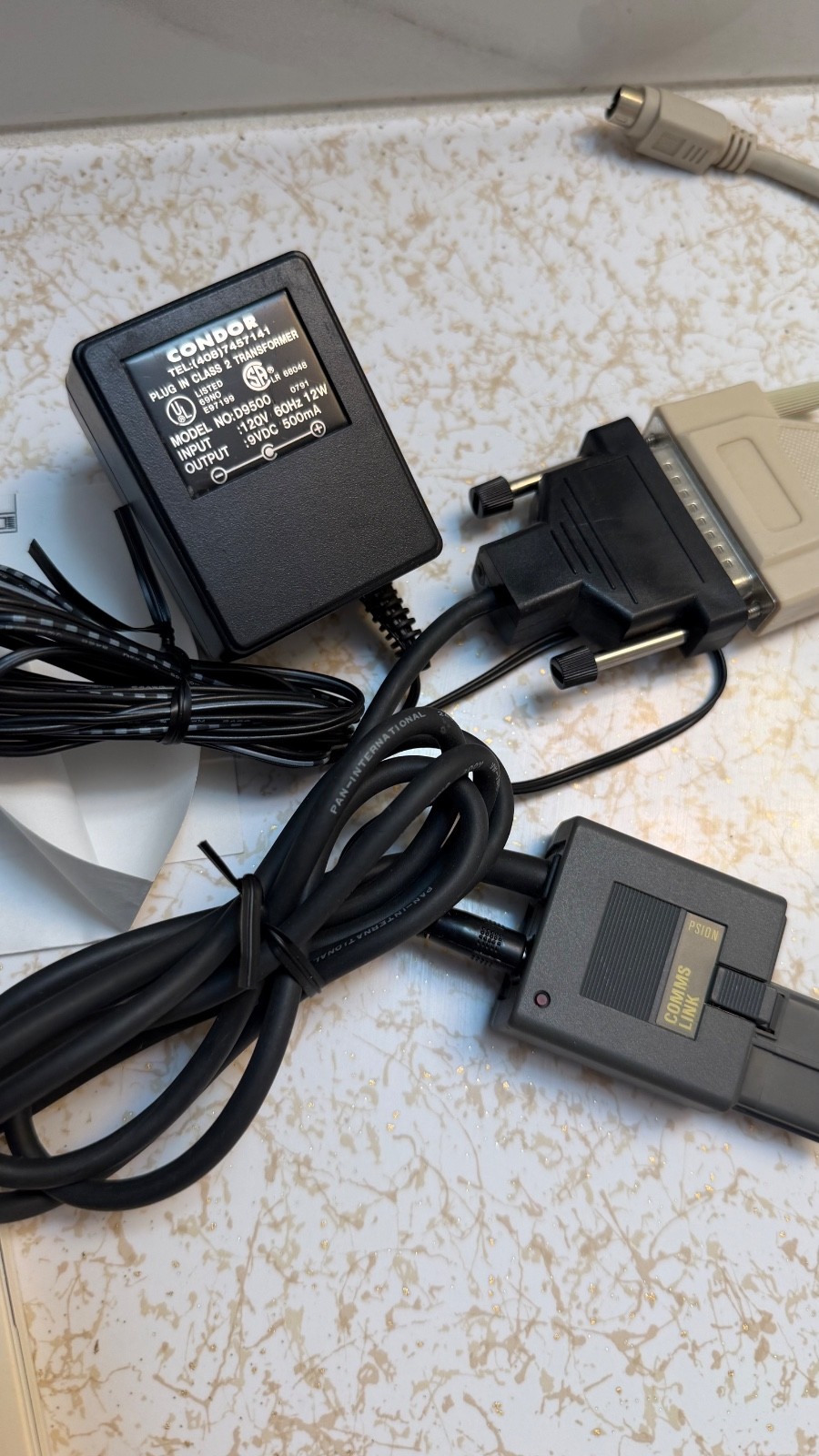 Psion Organiser II with powered comms link cable/charger 8K data pack