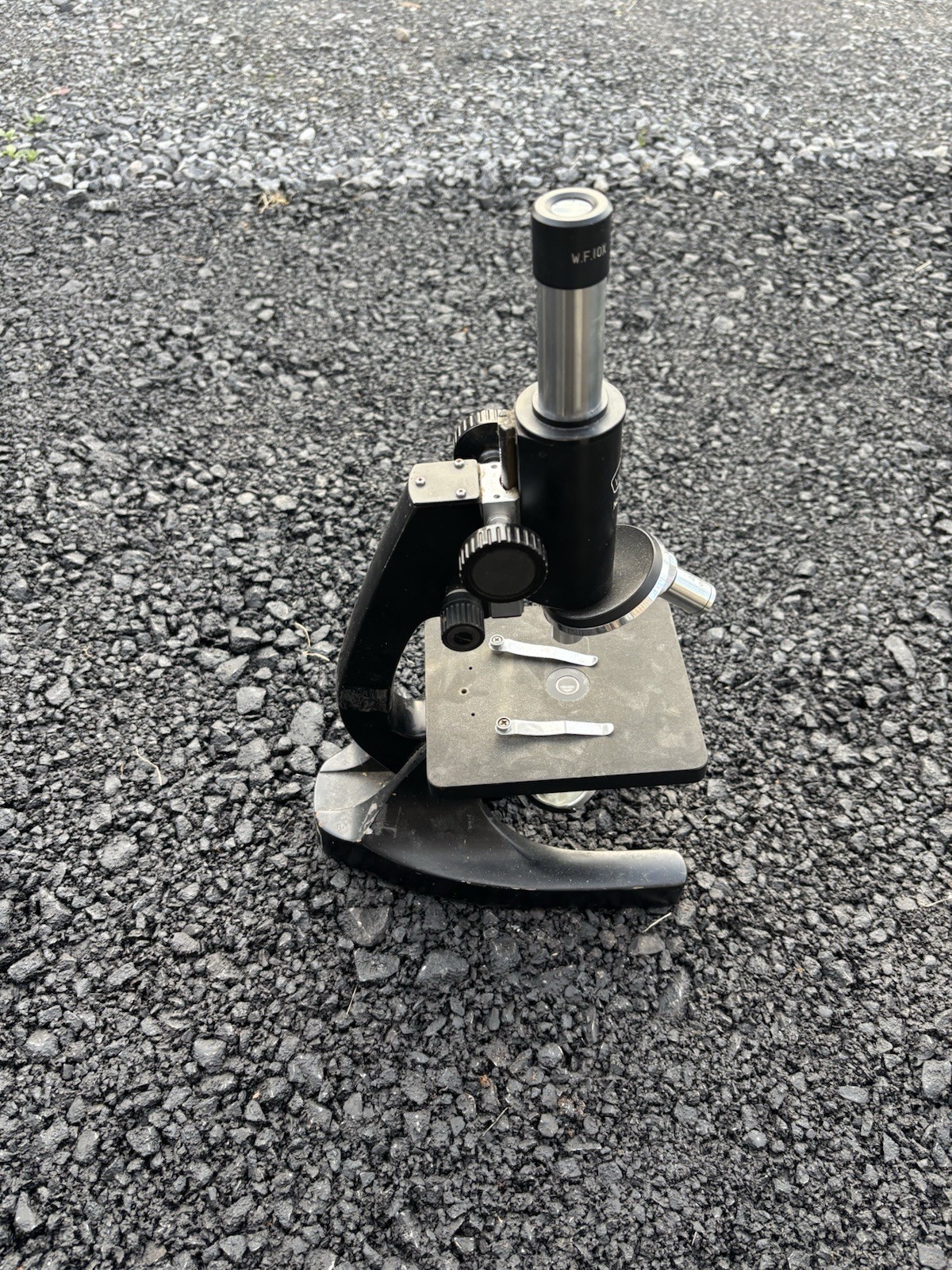 This is a vintage Wolfe student microscope likely imported from Japan,