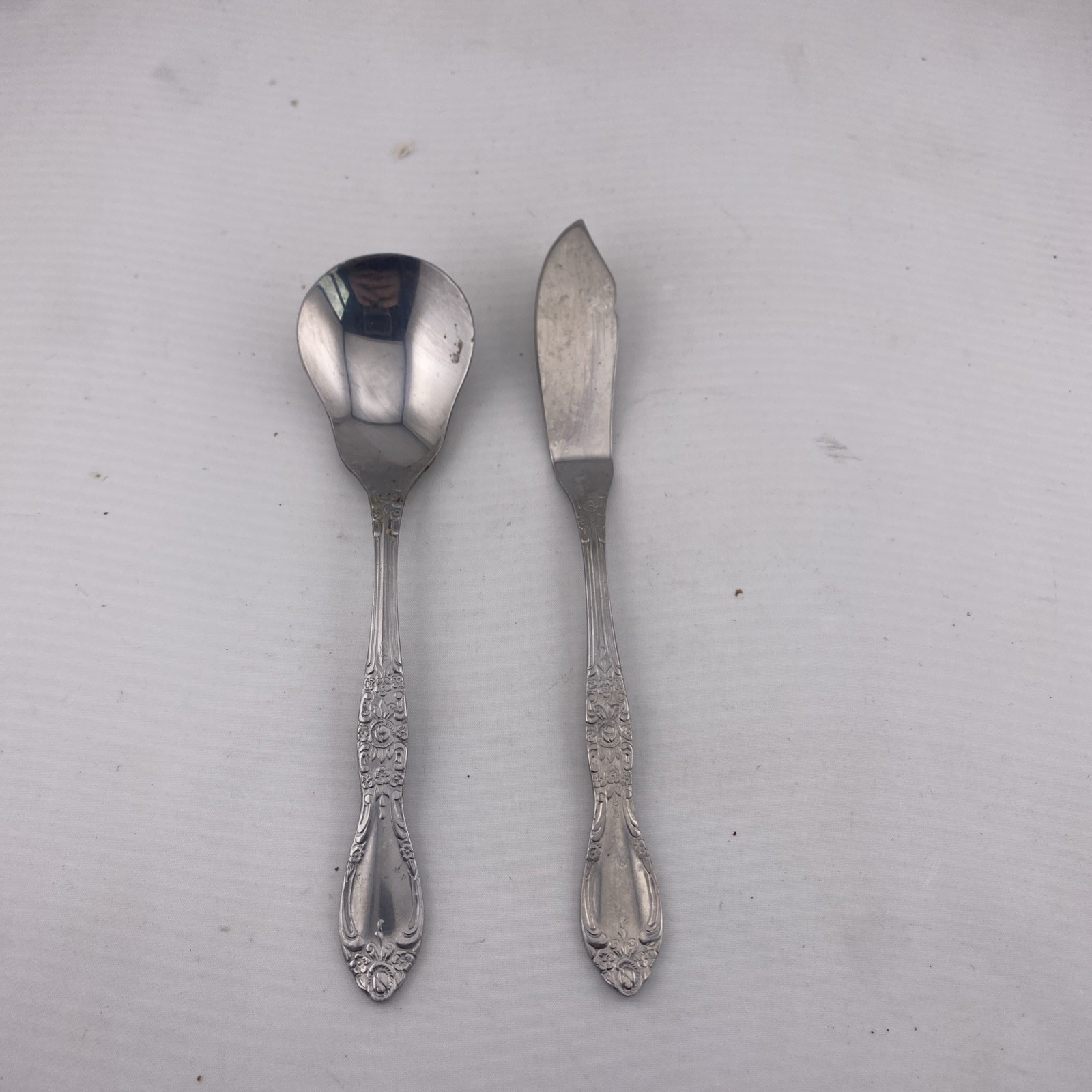 Northland Stainless Flatware Korea Floral Rose Pattern, button soon and knife