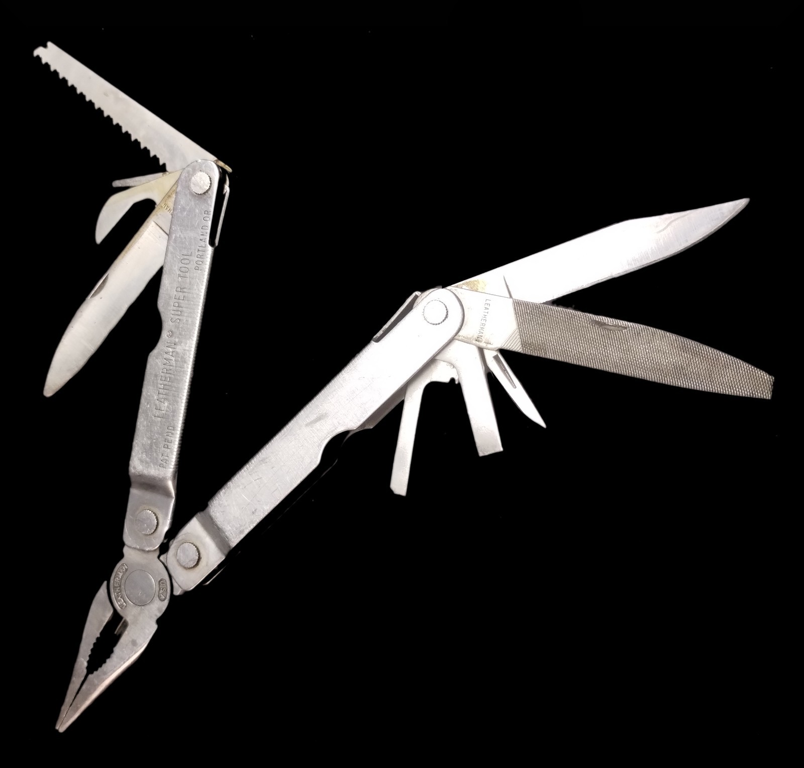 Good Previously Owned LEATHERMAN SUPER TOOL Patent Pending