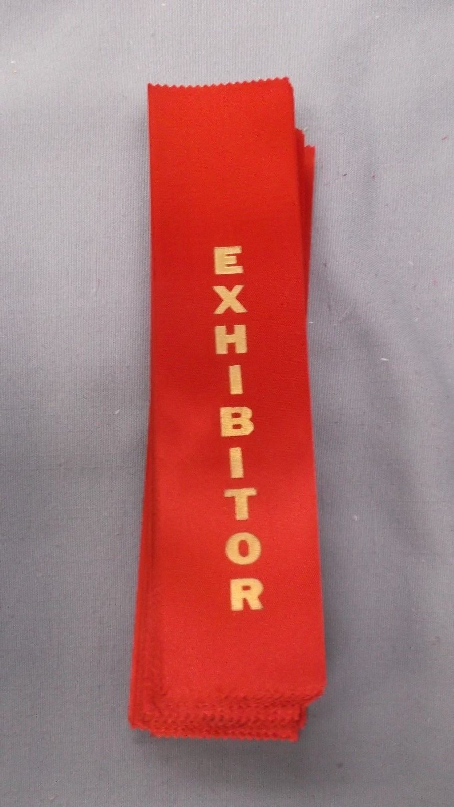 EXHIBITOR red ribbon with gold foil letters wholesale lot of 50