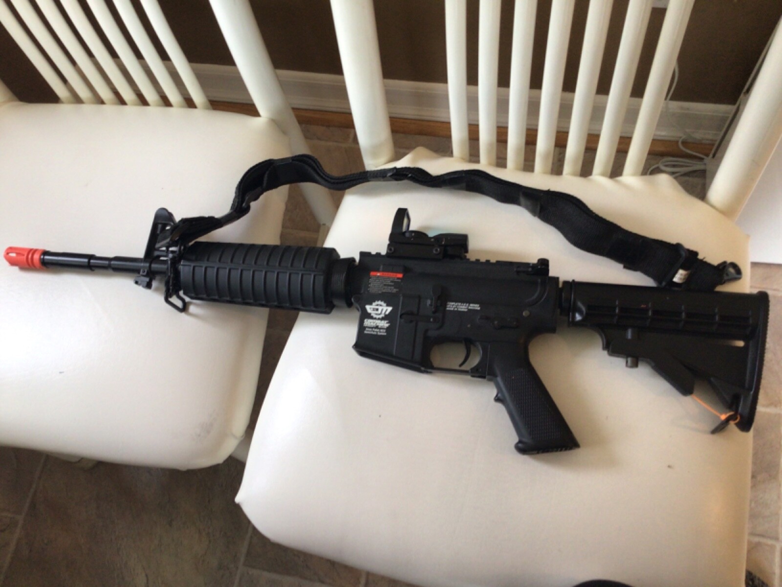 Combat Machine Airsoft 6mm pellet AEG semi/auto system with red dot scope