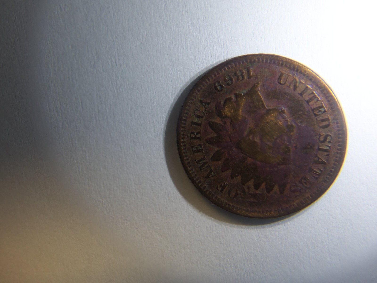 A RARE 1869 INDIAN HEAD PENNY