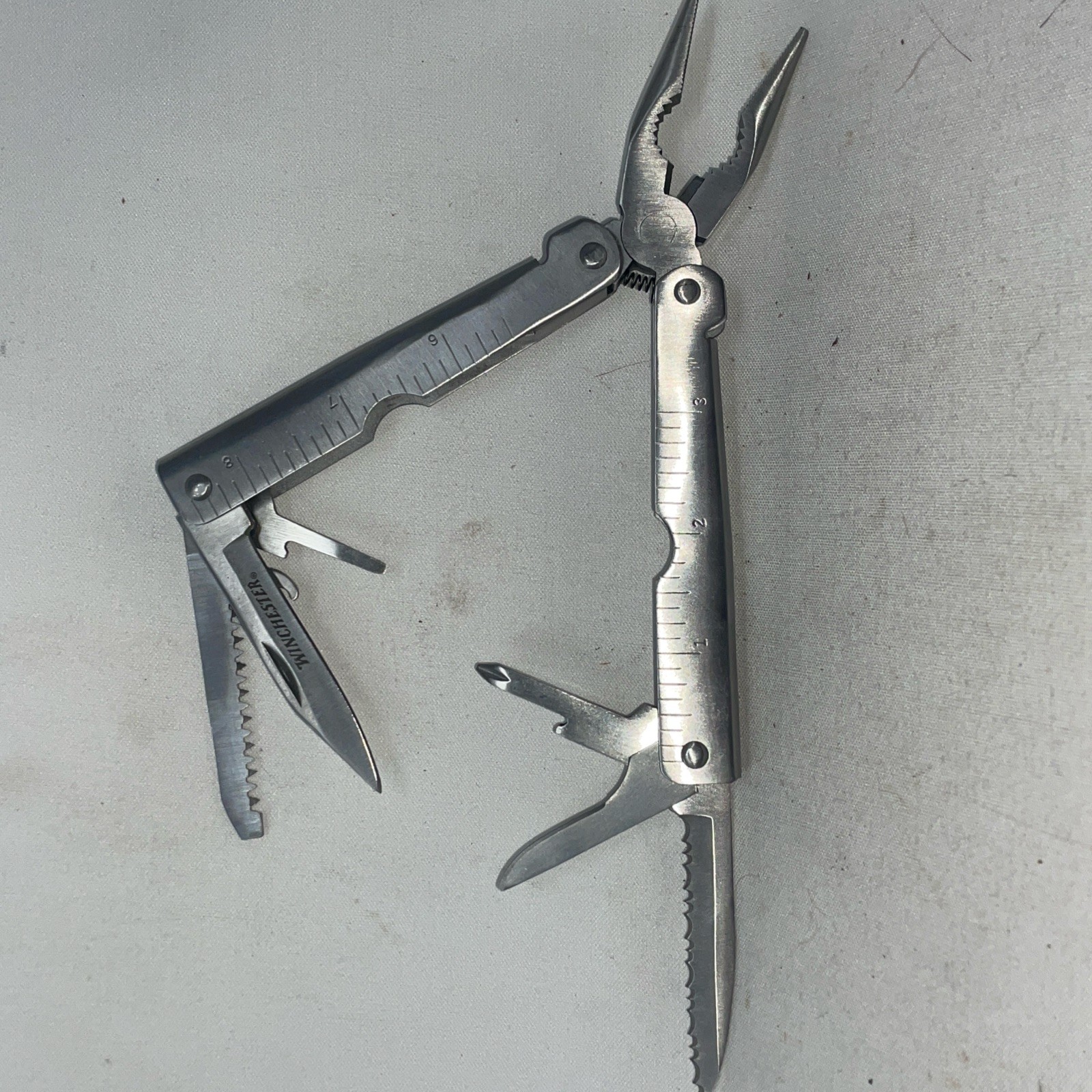 Matching Pair Winchester WinFrame Multi Tool Lot Spring Loaded Pliers, Driver