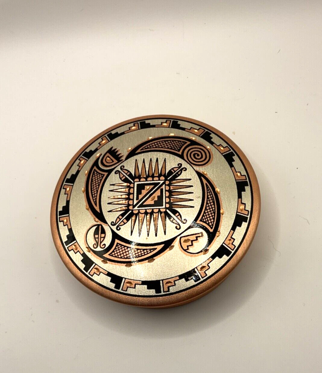 Copper lidded box from Greece 4” in diameter.