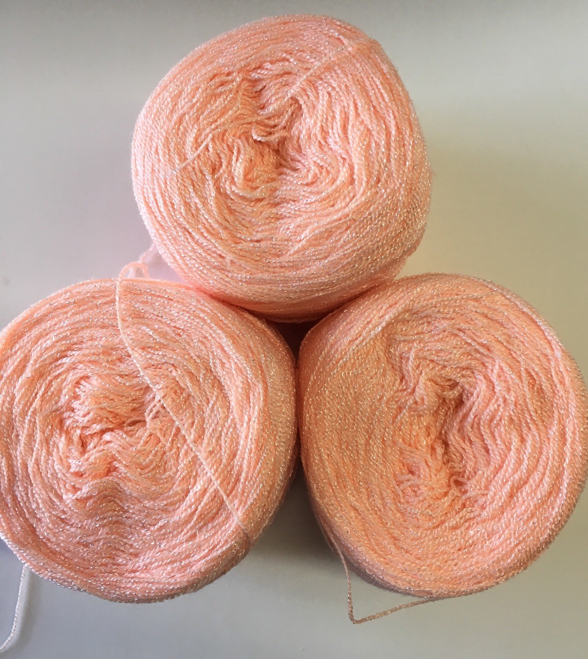 Hilo yarn Crystal Color 125- Melon Acrylic/Rayon.900 yards per ball. 1 set of 3.