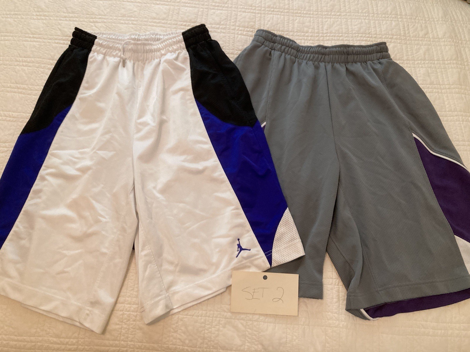 2 Nike long basketball shorts. Size: Large