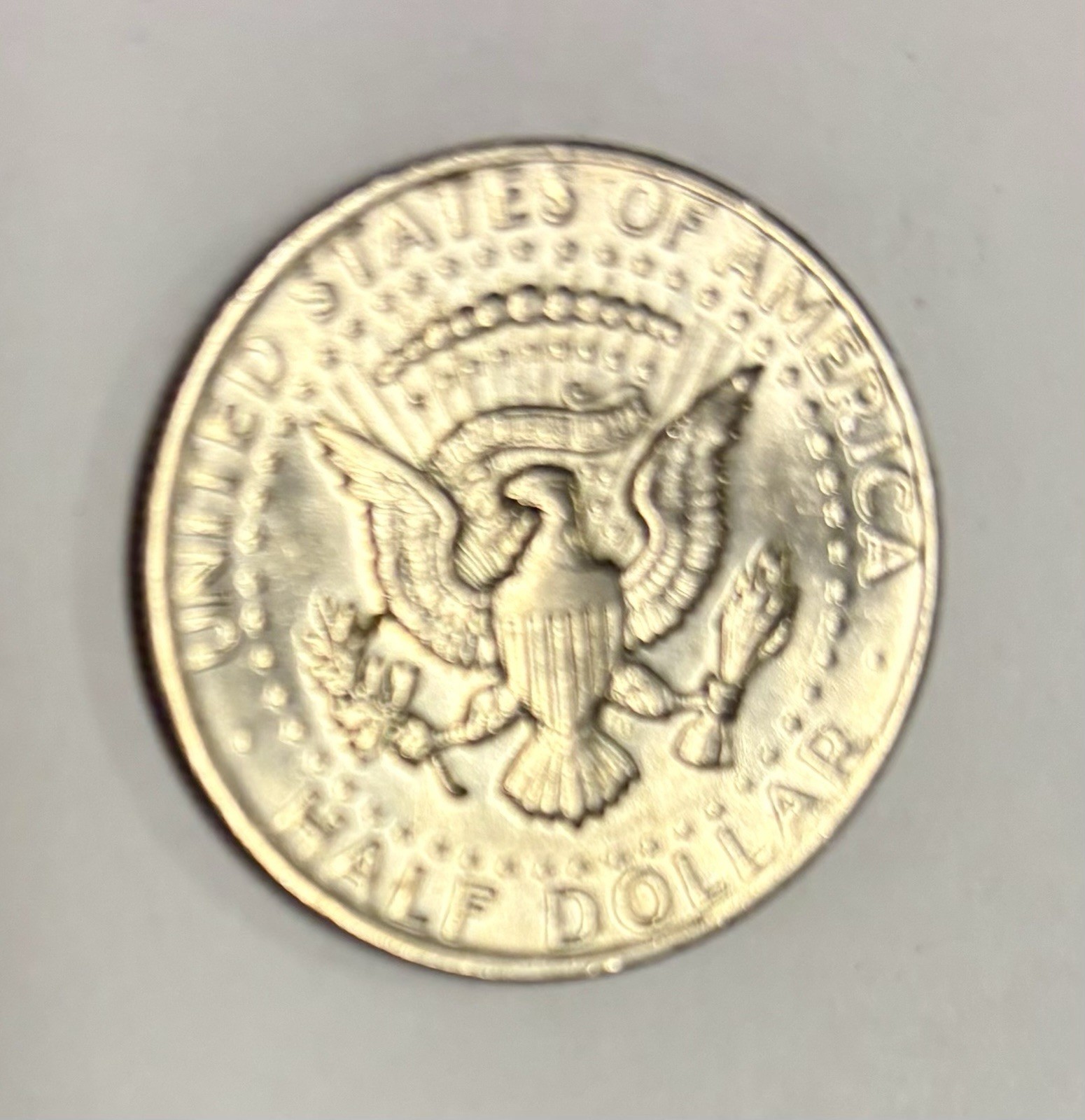 1973 Kennedy Half Dollar With No Mint Mark, Error On E