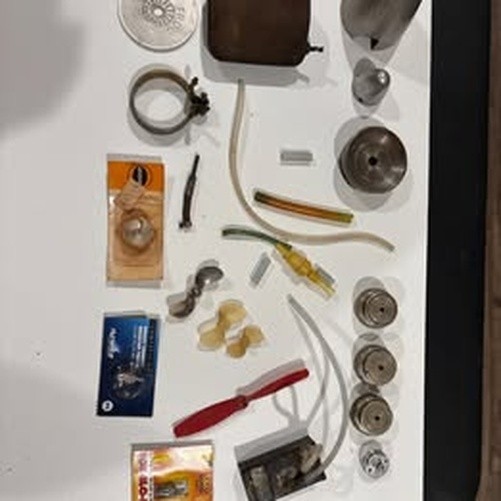 Vintage RC Model Airplane Parts Lot – Spinners, Props, Glow Plugs, Fuel System