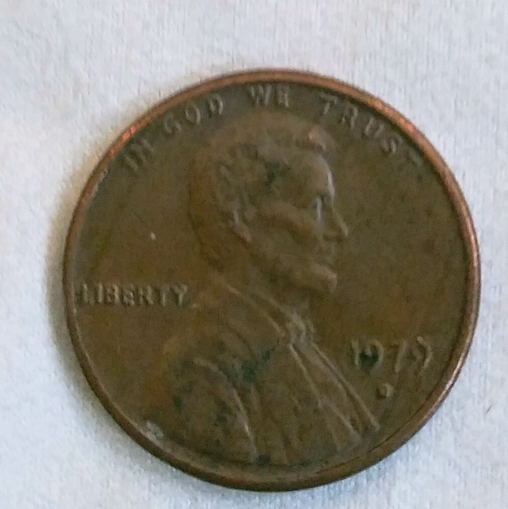 1979 D Lincoln Penny With filled in mint mark.