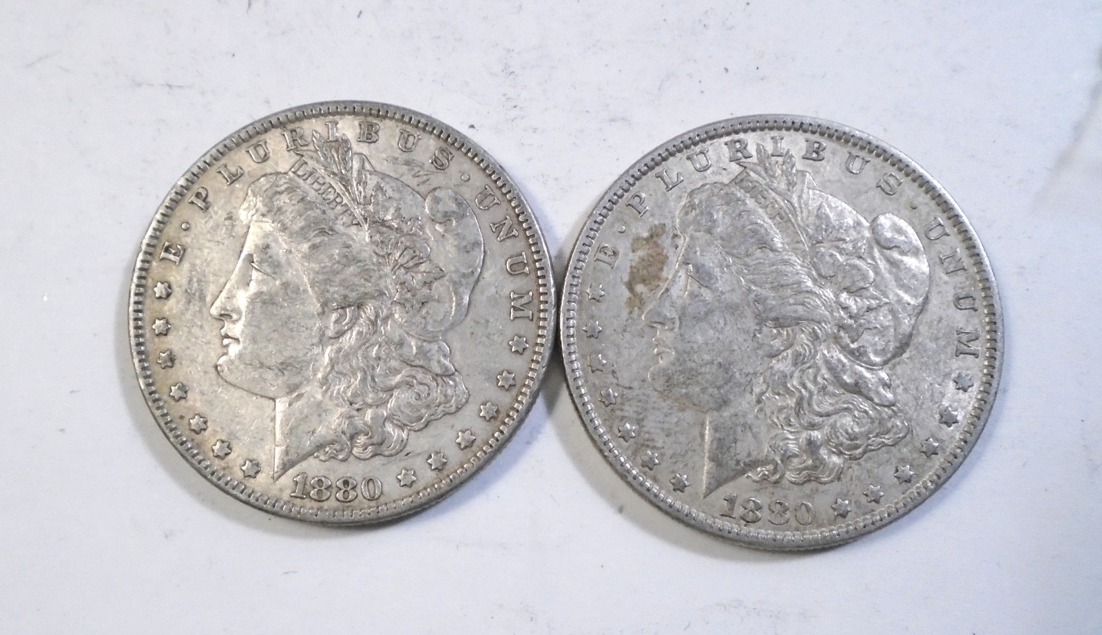 1880 $1 Morgan Silver Dollar -Lot of 2, 1 Philadelphia and 1 New Orleans Mint