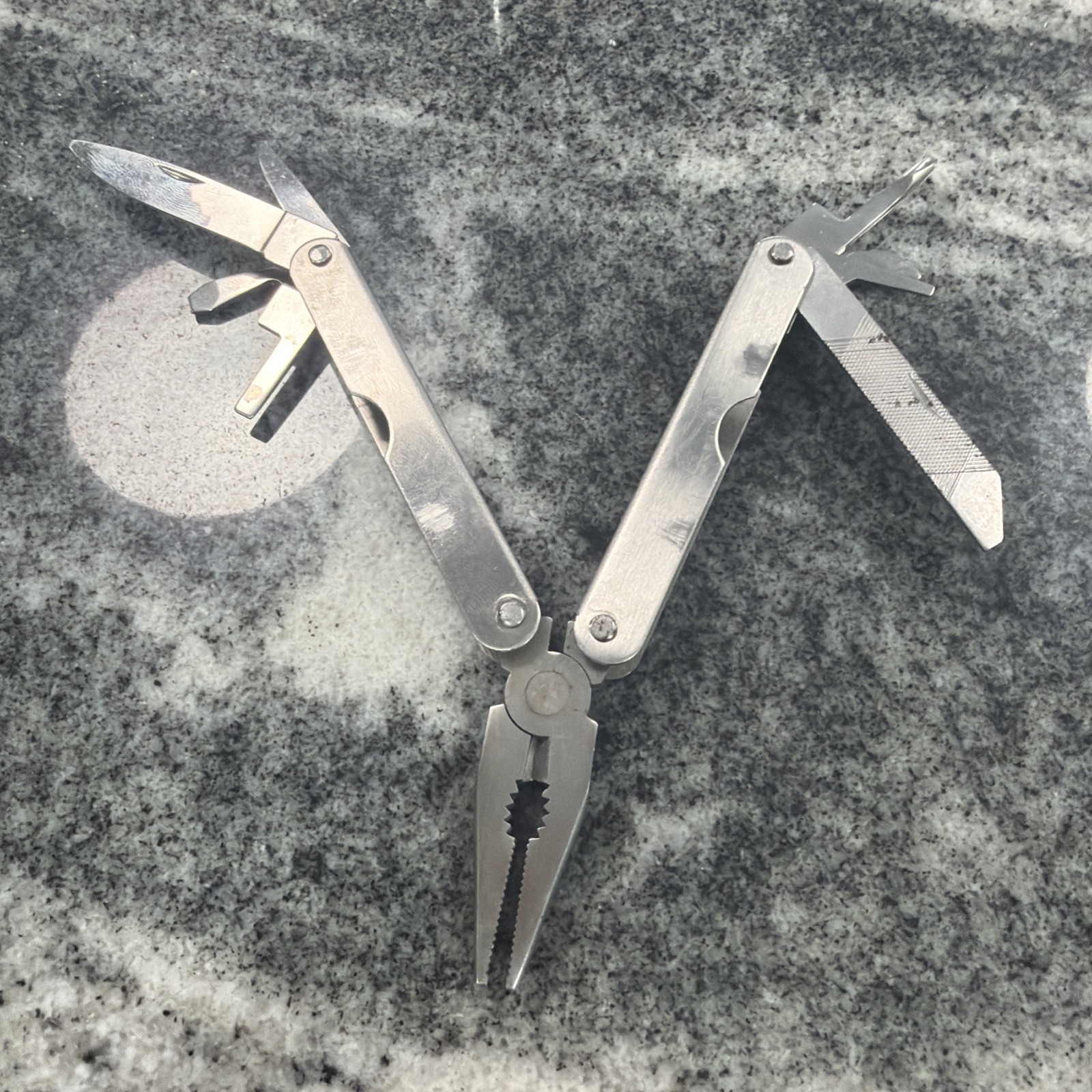 9 Tool Stainless Steel Multi Tool. Made In The Same Fashion As Original Leather