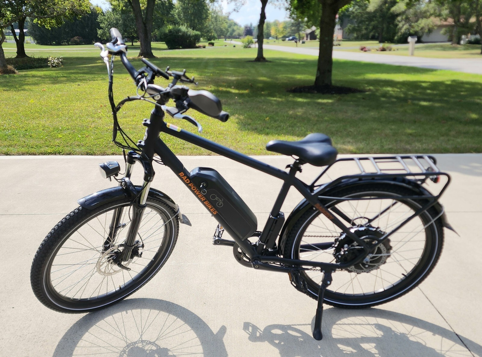 His and Hers RadCity4 Bikes - Virtually NEW! Includes Carrier, Cover, Misc