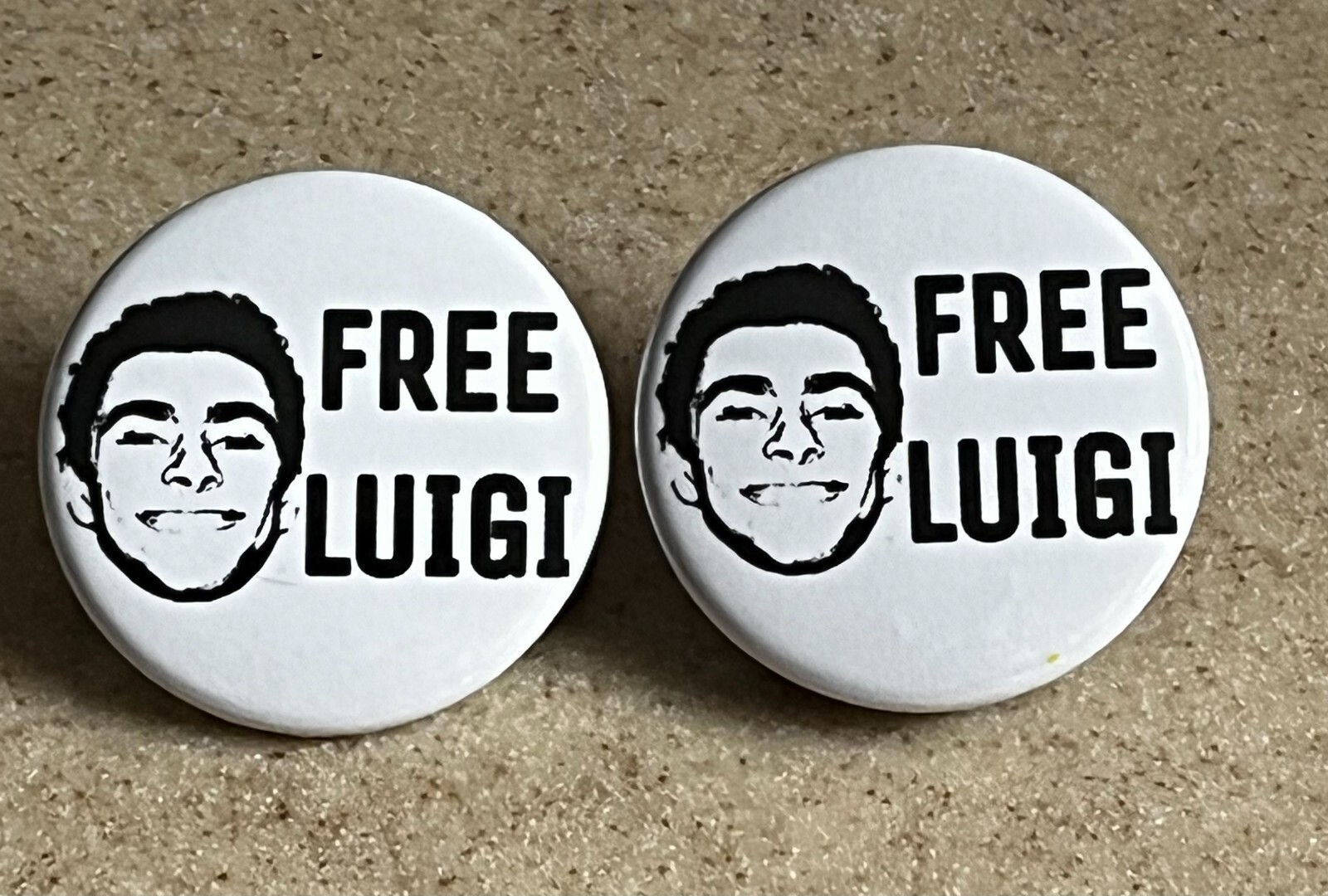 "Free Luigi" 2-Pack,Pin-Backs,  1 1/2 inch.