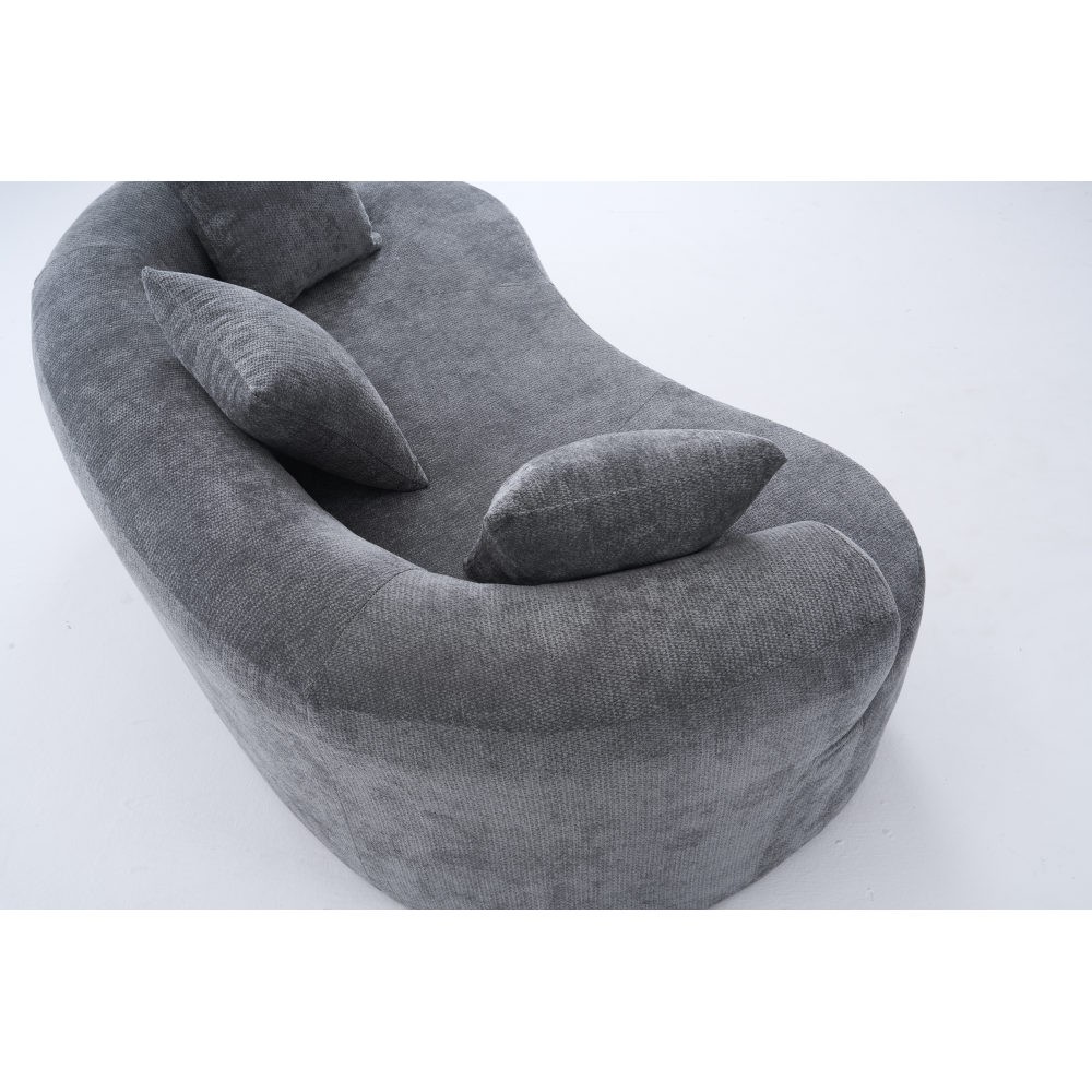 Crescent-shaped sofa, modern low-back design with deep cushions, self-inflating