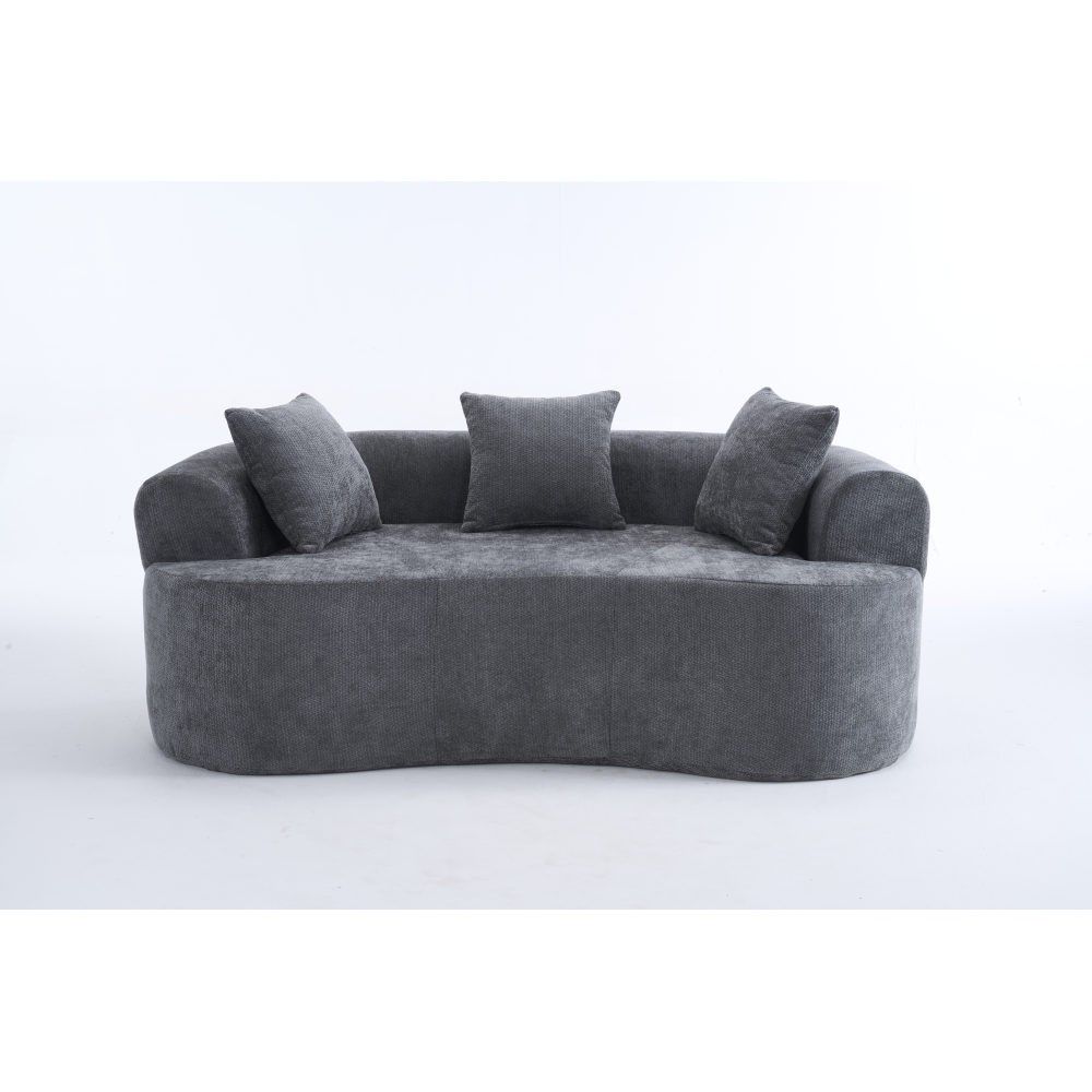 Crescent-shaped sofa, modern low-back design with deep cushions, self-inflating