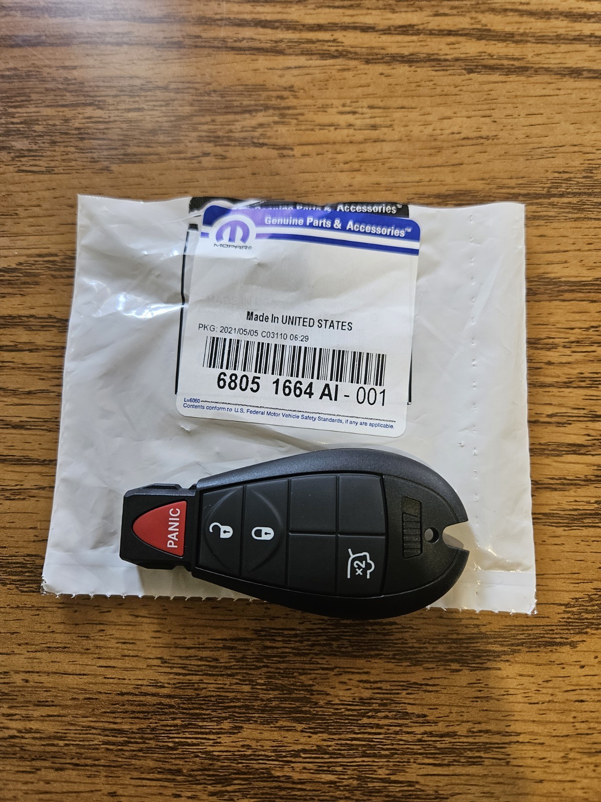 Mopar OEM FOBIK 4 button Key Part# 68051664AI