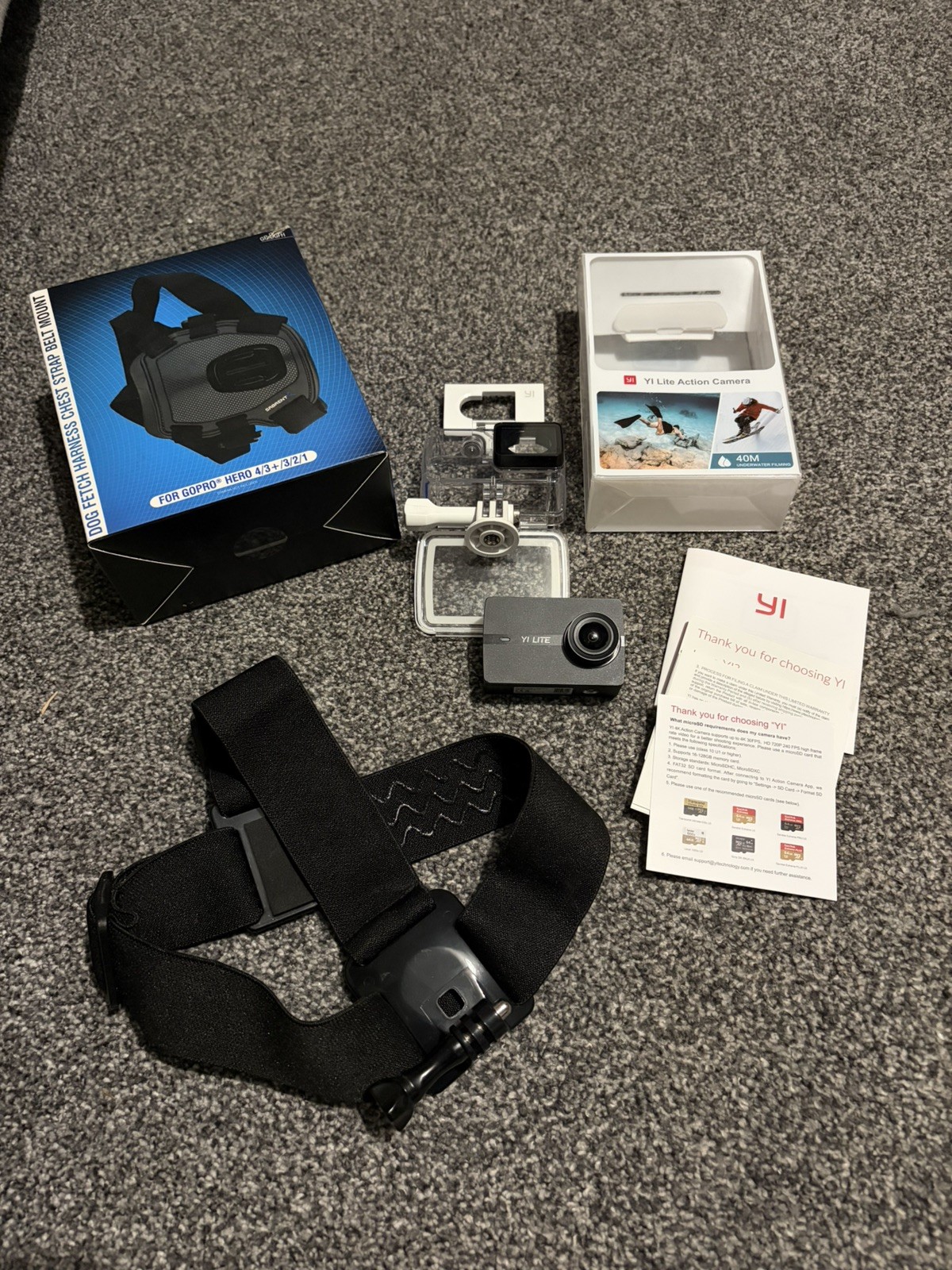 YI Lite Action Camera with head strap and dog harness new battery in excl cond