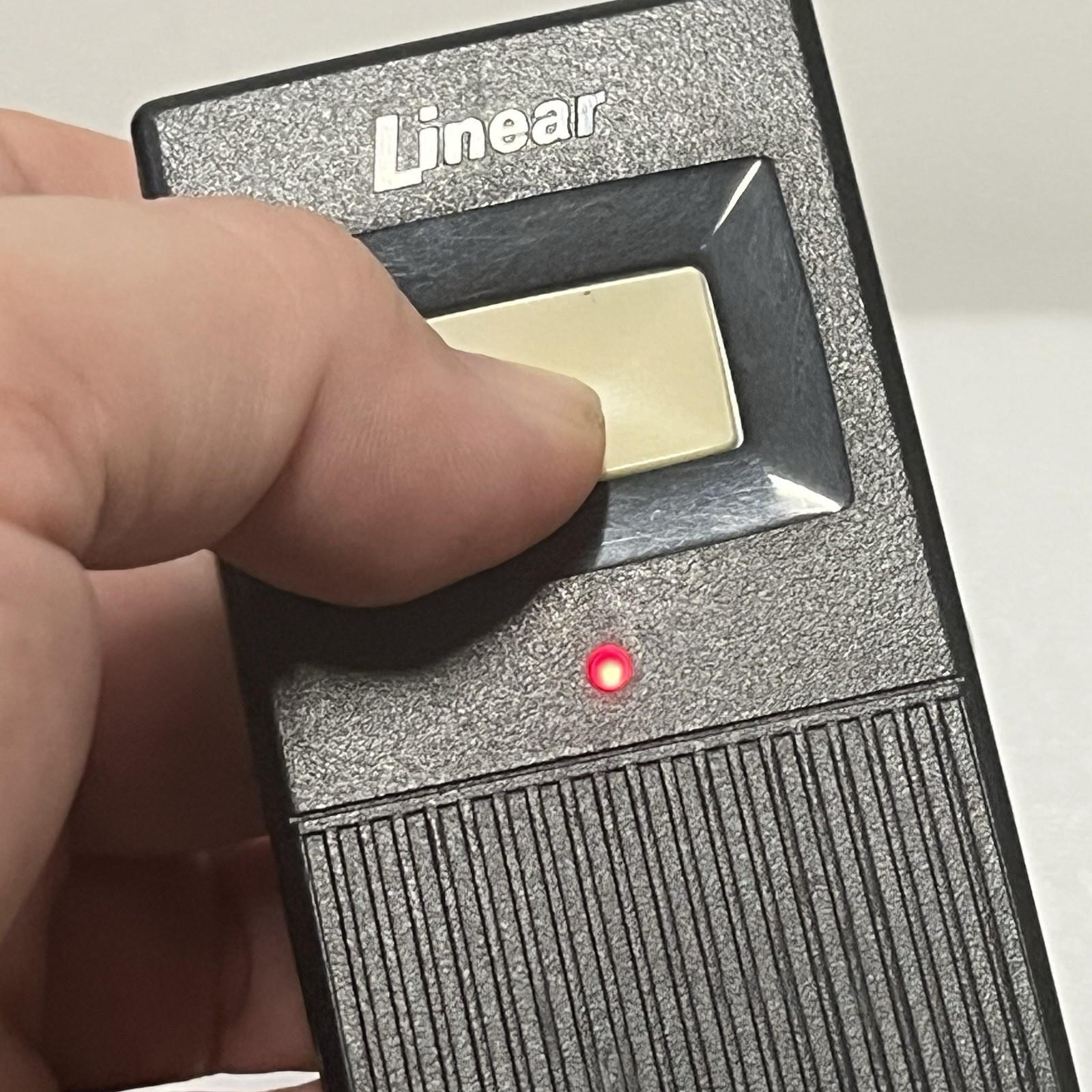 Linear DNT00002A Garage Door Gate Remote 310MHz 1 Button Visor Clip