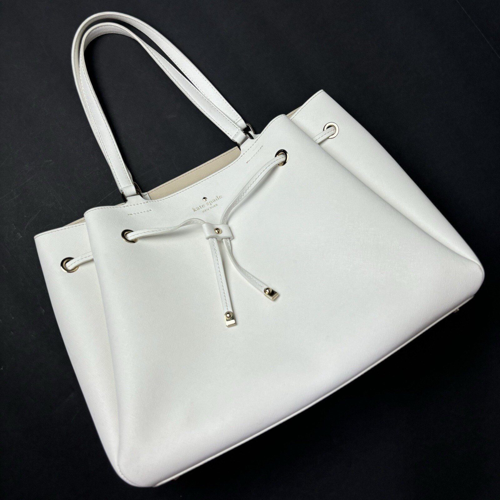 KATE SPADE NEW YORK IVORY SAFFIANO LEATHER LARGE DRAWSTRING BUCKET HANDBAG GUC