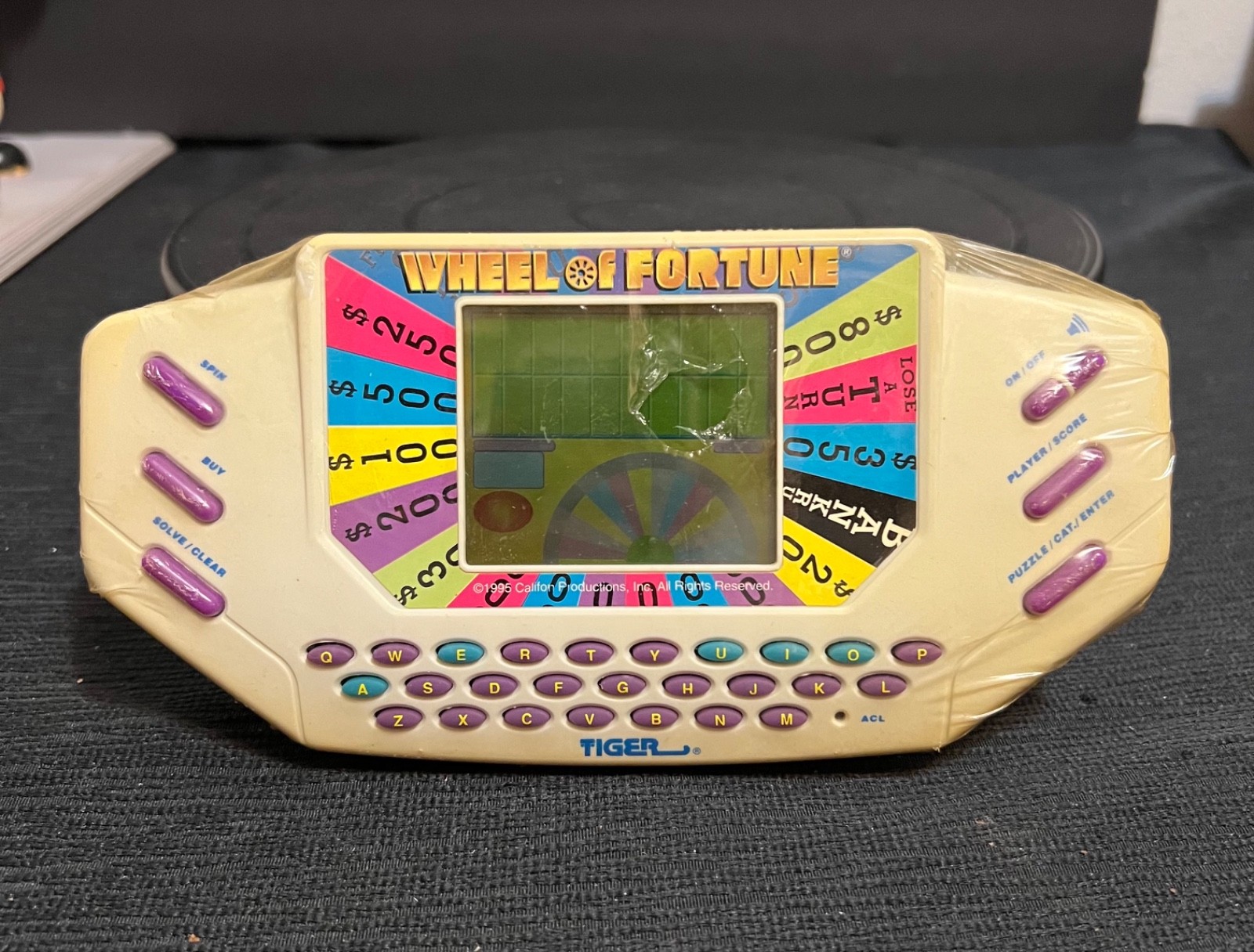 VTG  1995 Tiger Wheel of Fortune Electronic Handheld Travel Game TESTED WORKS