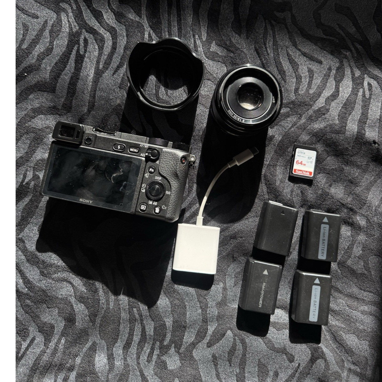 Sony Alpha 6400 Camera + Accessory Bundle Lens, Batteries, Charger, 64GB SD Card