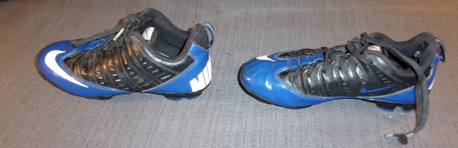 NIKE BLUE AND BLACK CHILDREN'S CLEATS 4.5 YOUTH