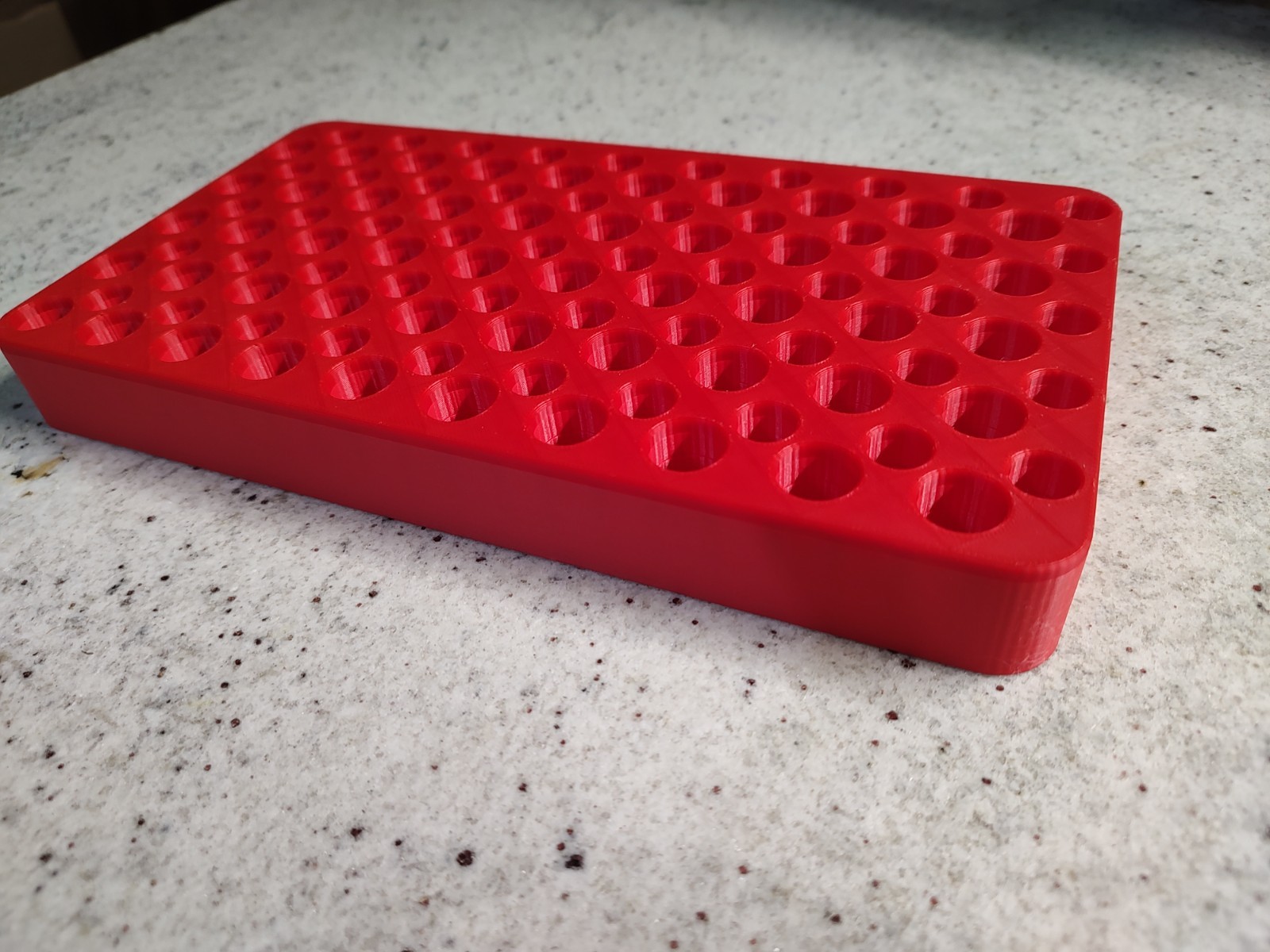 Universal loading/reloading tray. New 3D printed in red.