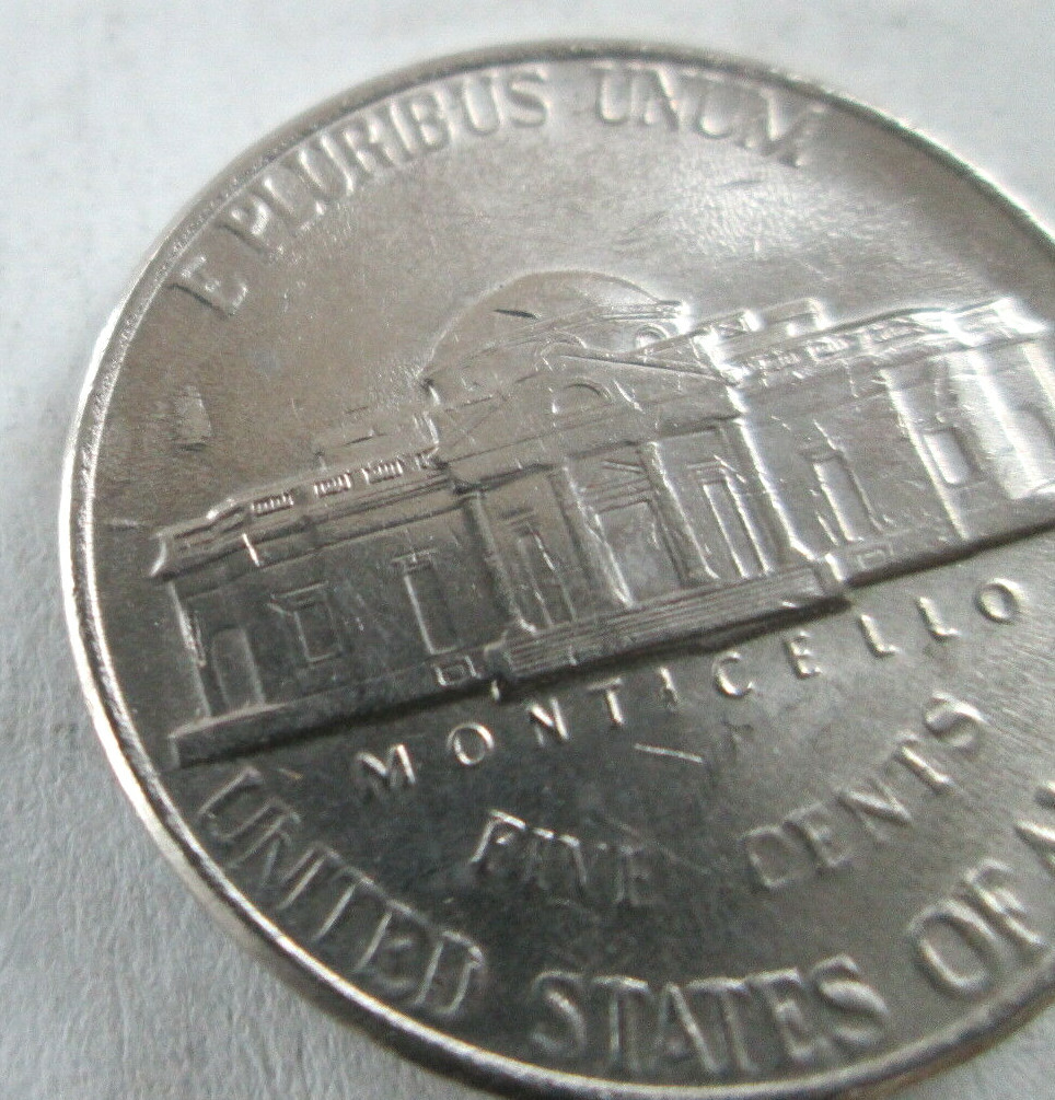 1997-P JEFFERSON, REVERSE RAISED METAL DIE CHIPS BELOW "E", XF, CIRCULATED
