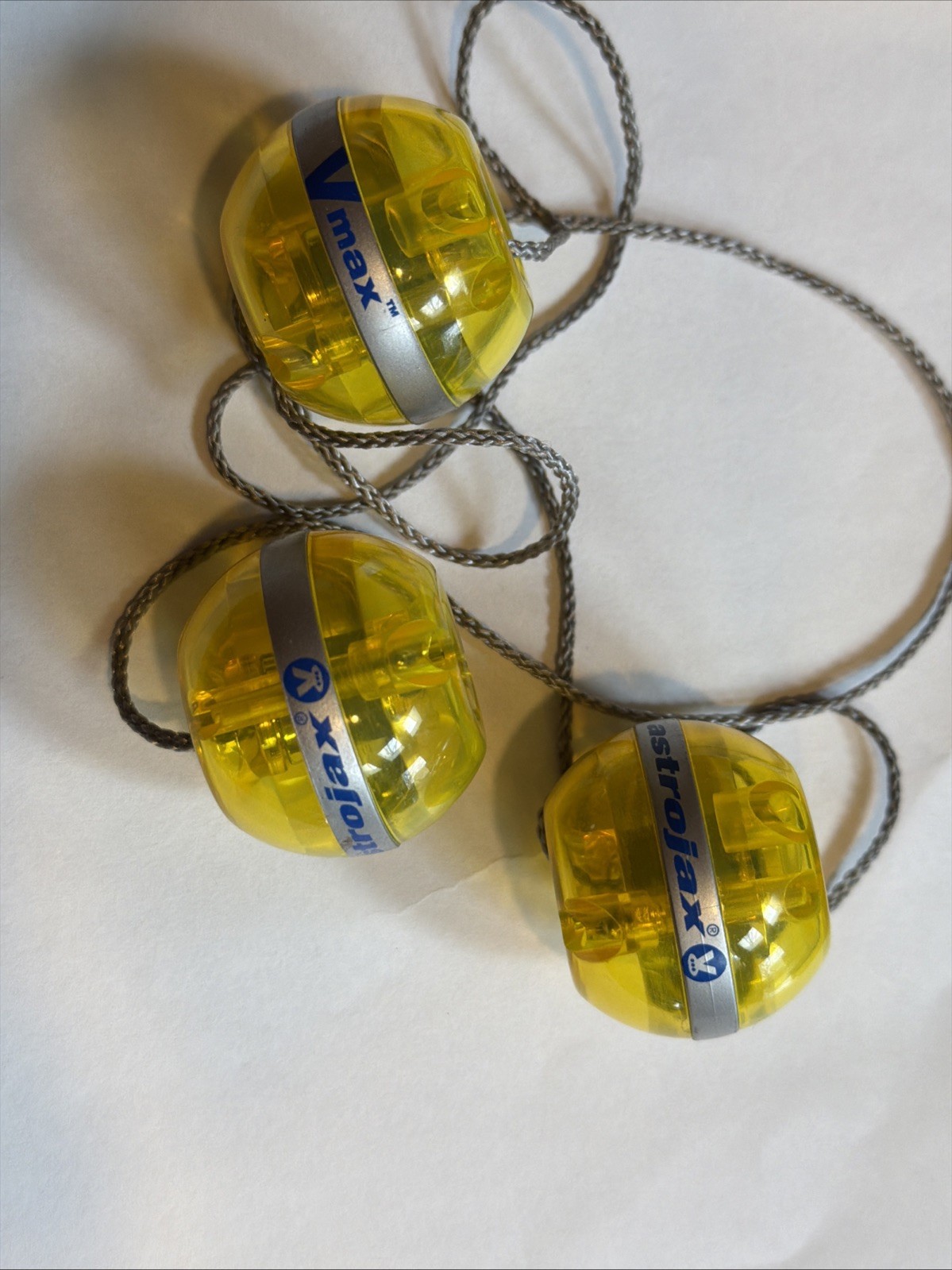 Astrojax V-Max Swinging Ball Toy Yellow