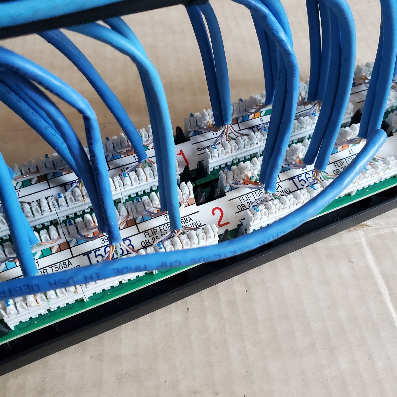 48-Port eXtreme Cat 6+ Flat 110-Style 2RU Patch Panel with Cable Management Bar