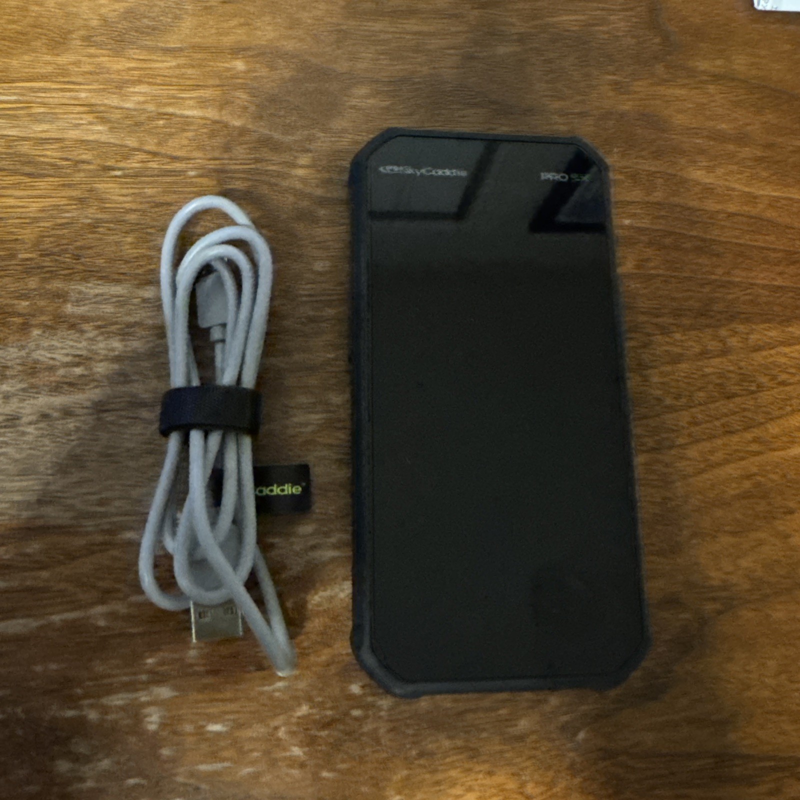 SkyCaddie Pro 5X Golf GPS with magnetic golf cart carrier