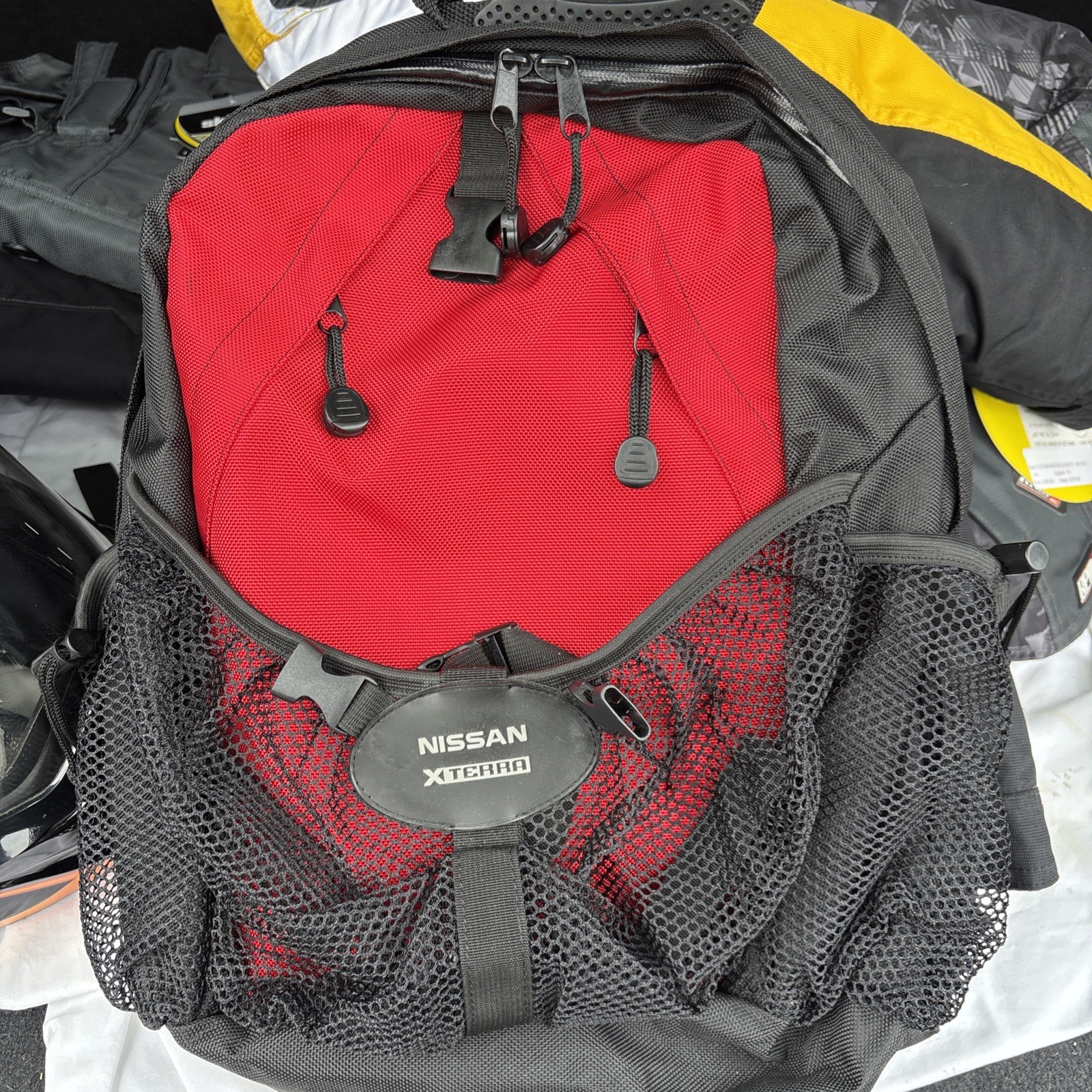 Nissan Xterra Triathlon Red and Black Motorcycle/Hiking/Camping/Backpack Bag