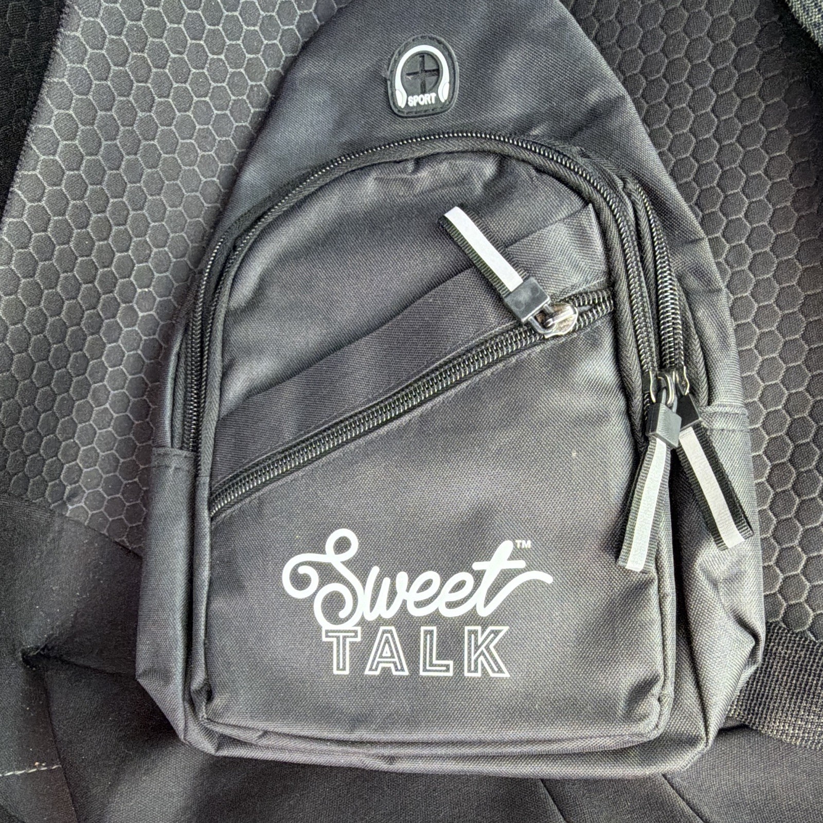 Sweet Talk Black 5L Sling Backpack, Zip Closure, Adjustable Strap, Logo