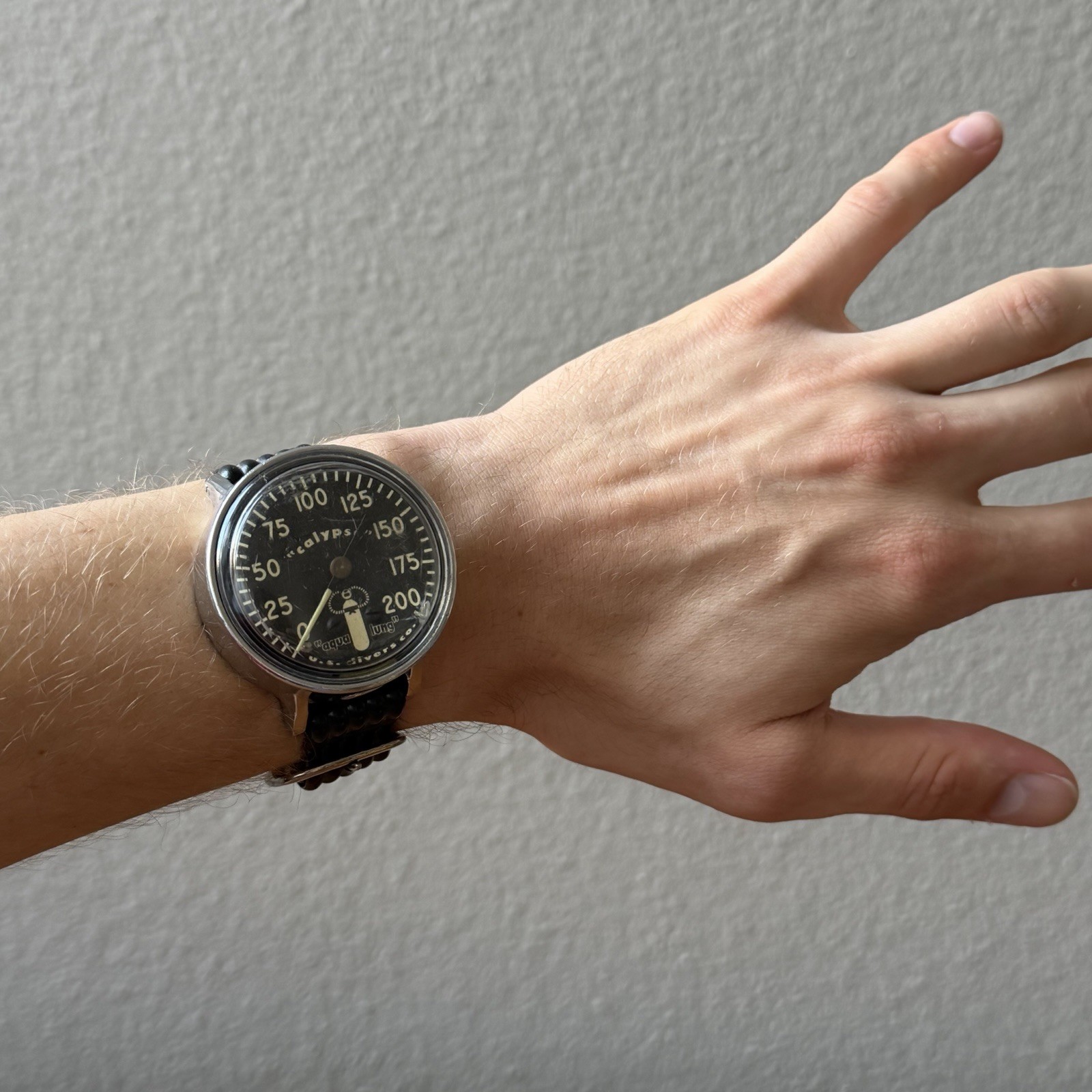 Vintage US Divers Calypso Aqua Lung 200' 48mm Silver Case Black Band Depth Gauge