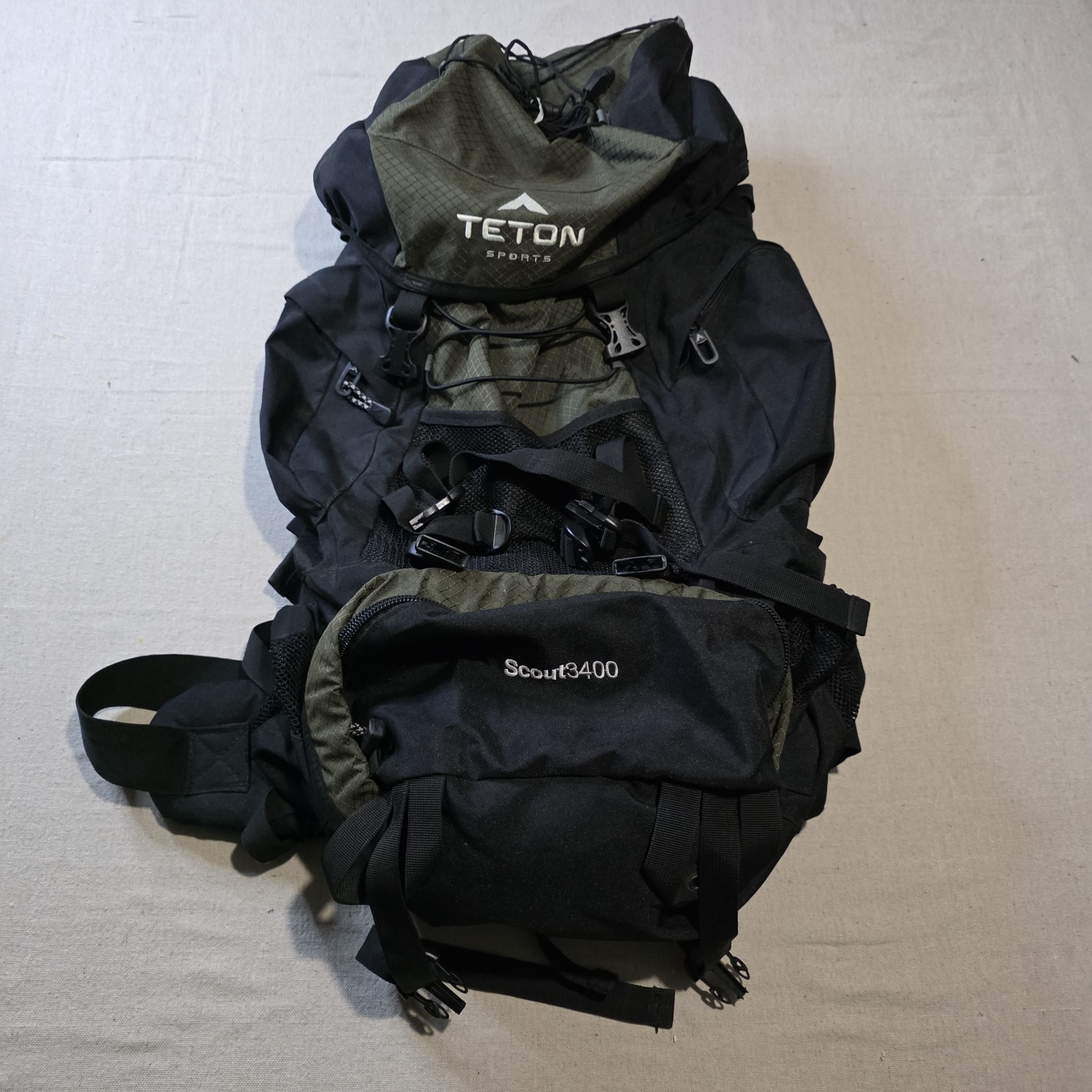 Teton Sports Scout 3400 Internal Frame Backpack 55L Olive Black Hiking Camping