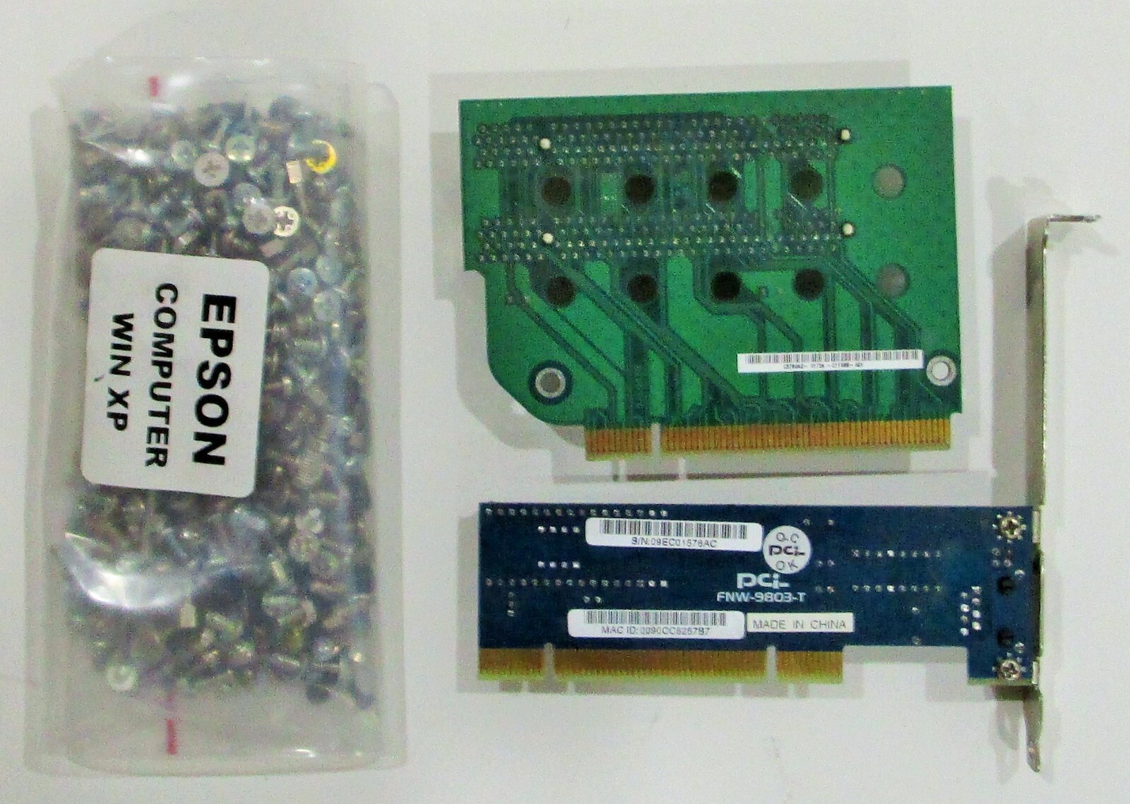 LAN card FNW-9803-T - PCI RISER CARD - plus assorted computer screws