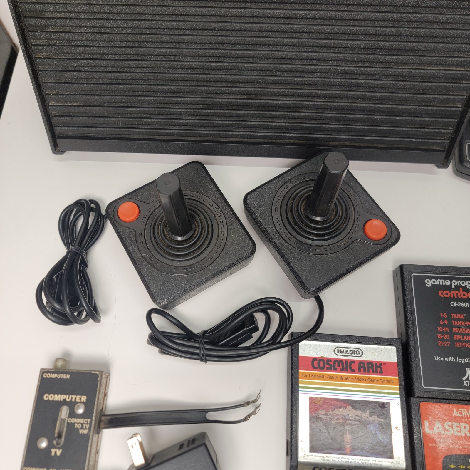 Atari 2600 Console * Controllers * Games ** Large Lot ** Untested