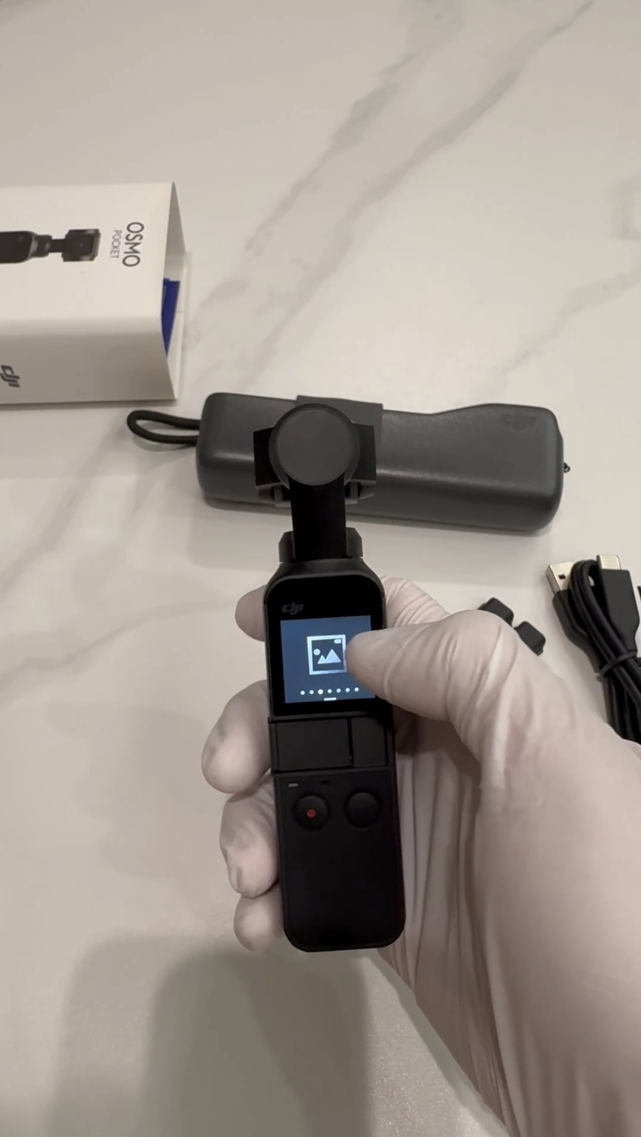 DJI Osmo Pocket-Handheld 3-Axis Gimbal Stabilizer with integrated Camera
