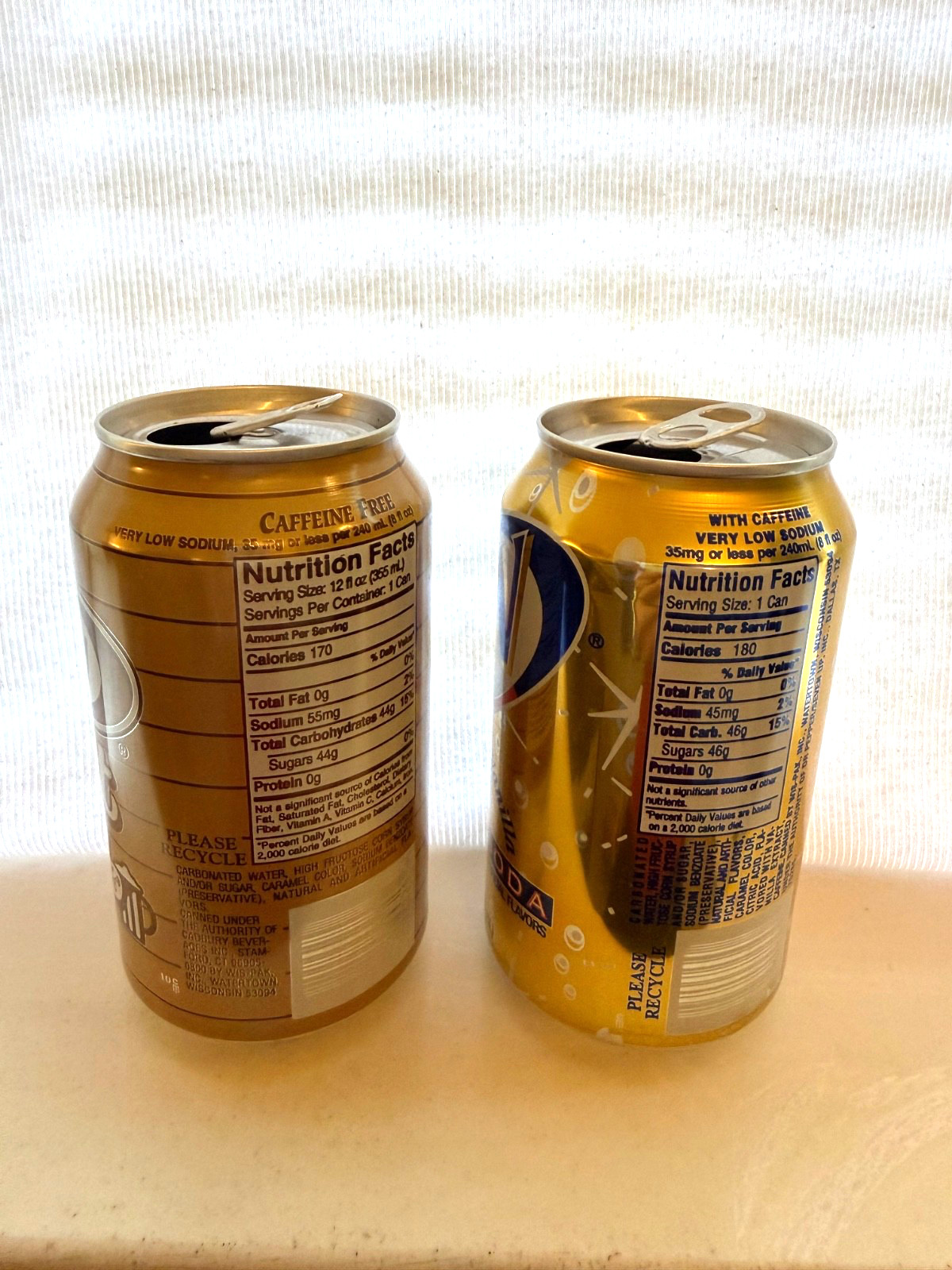 Four A&W Root Beer cans from the 1990's 12oz each