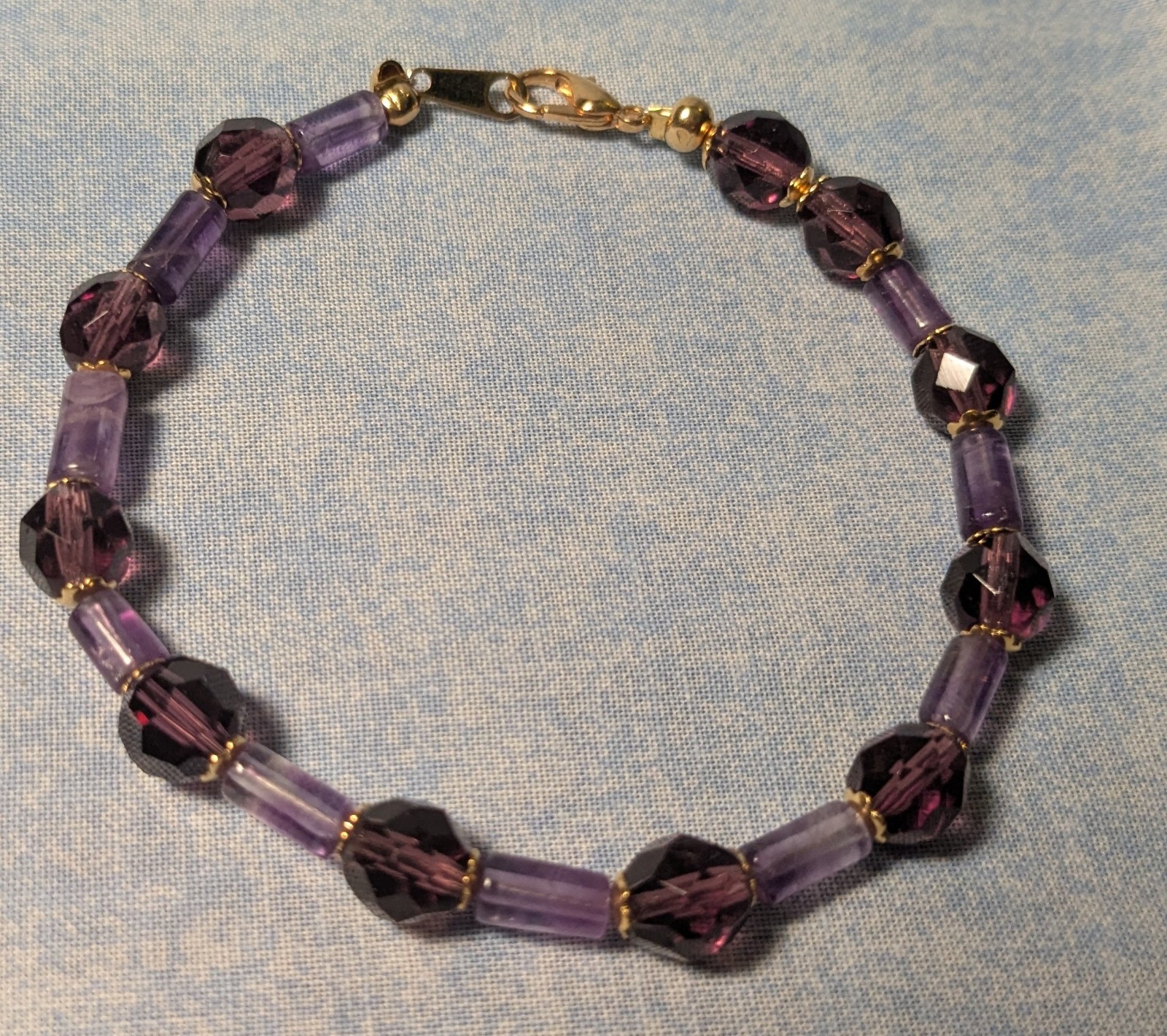Handmade beaded bracelet 8" Amethyst round faceted & log shaped beads