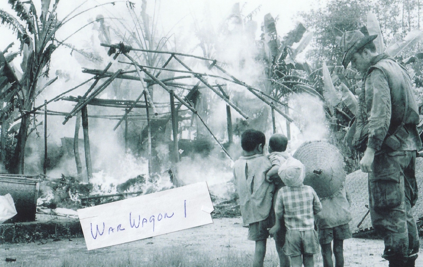Vietnam  War  Photos --   Soldiers At Burning Village